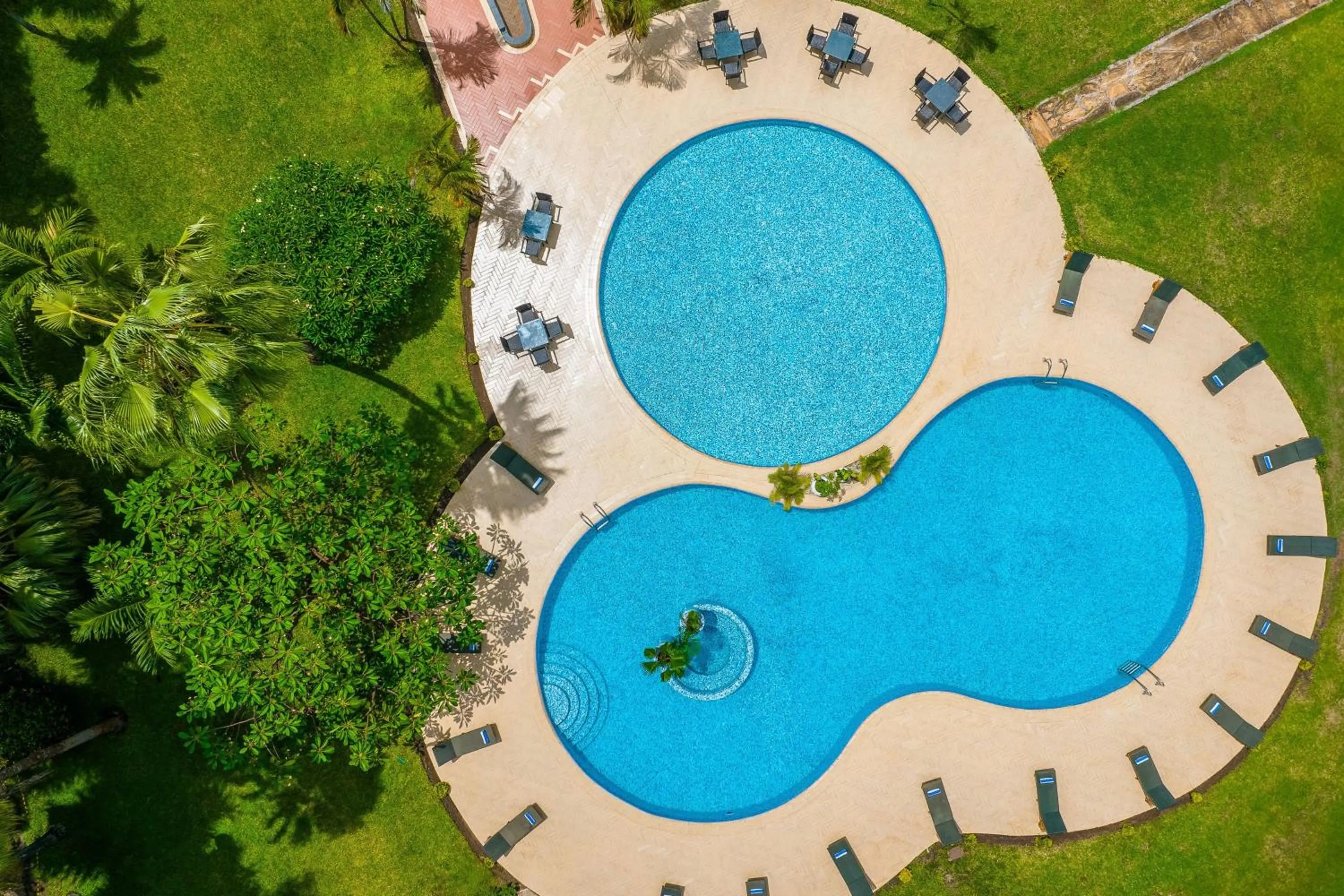 Swimming pool in Delta Hotels by Marriott Dar es Salaam