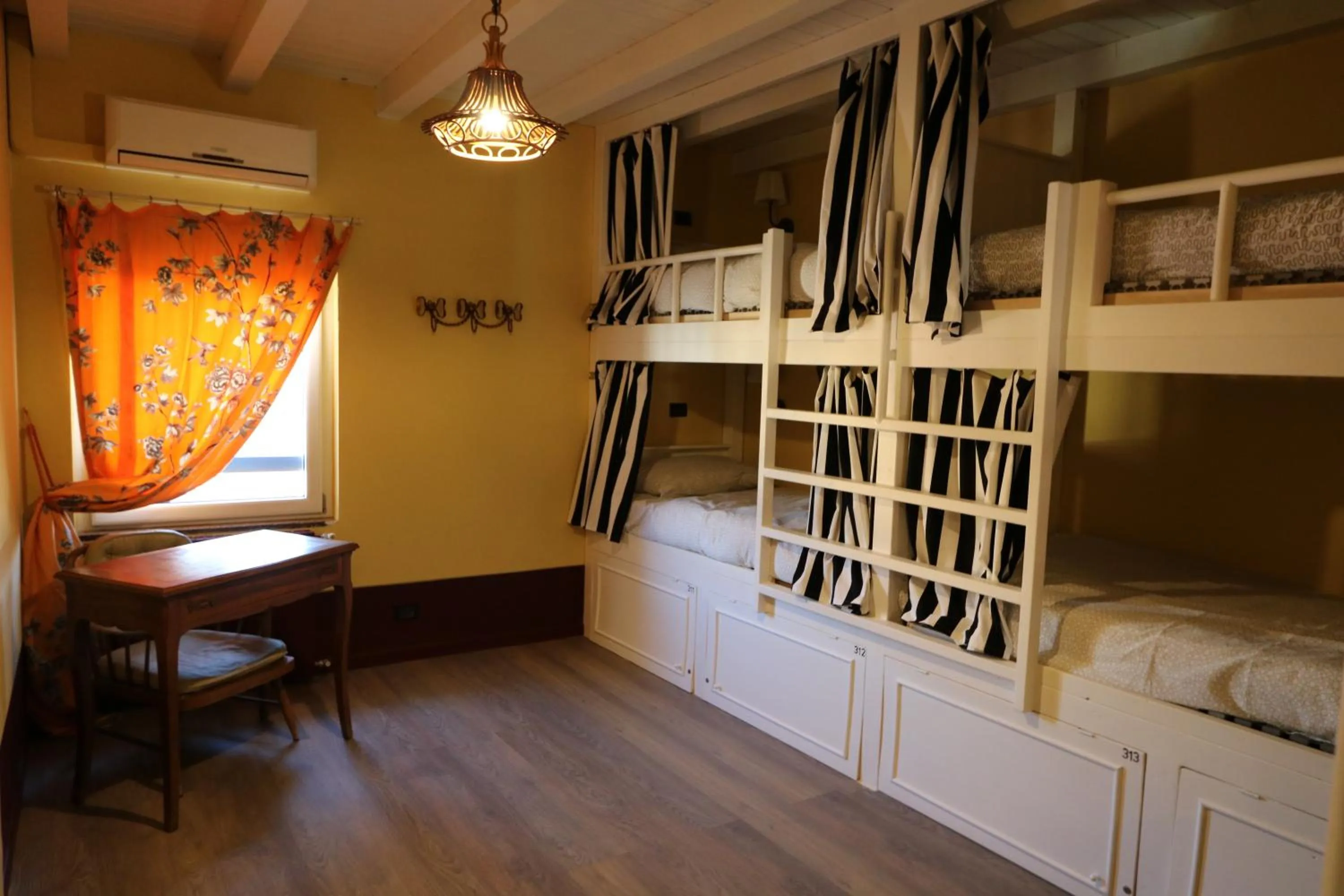 Living room, Bed in Grand Hostel Coconut