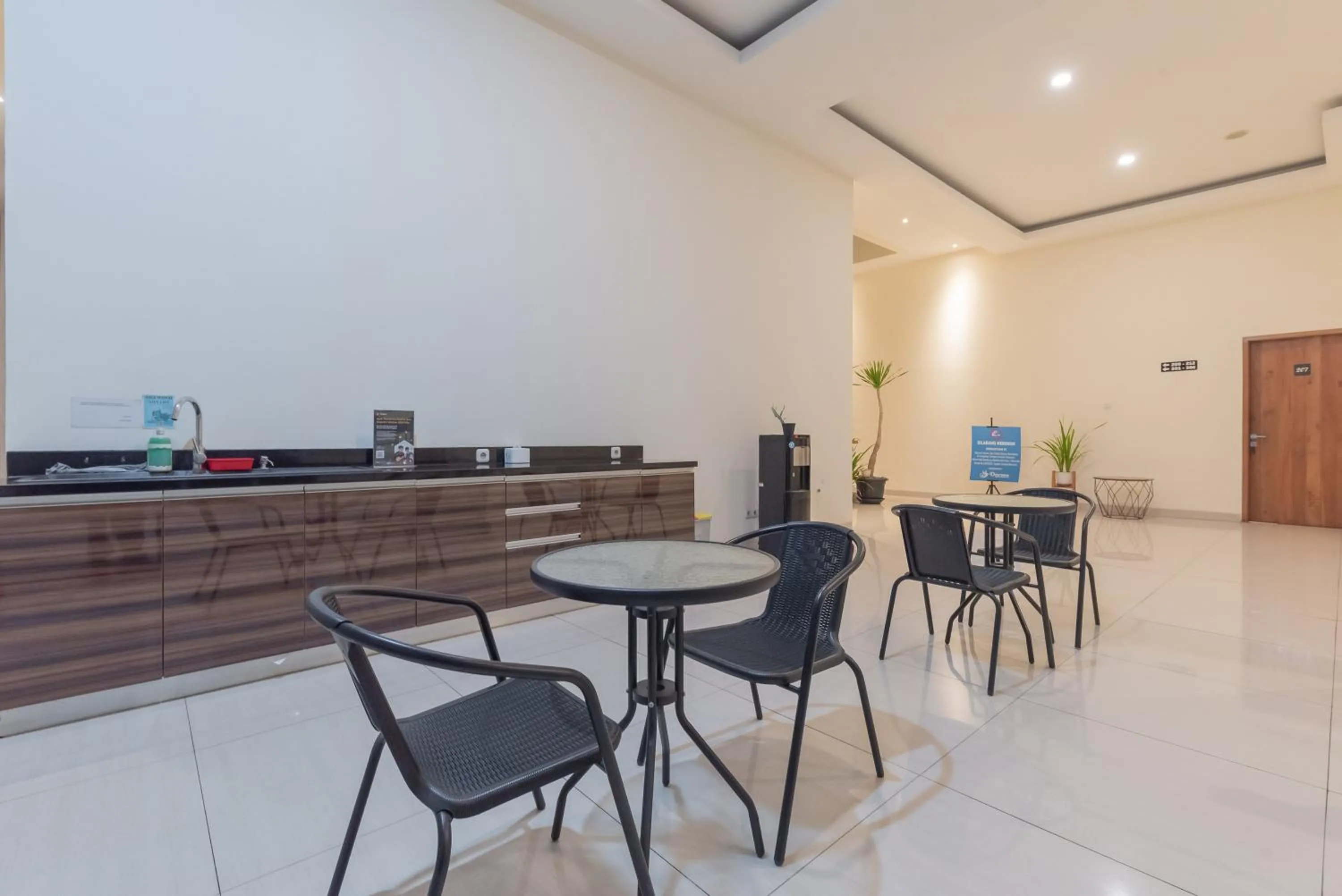 Seating area in Urbanview Darmo Residence Bandung