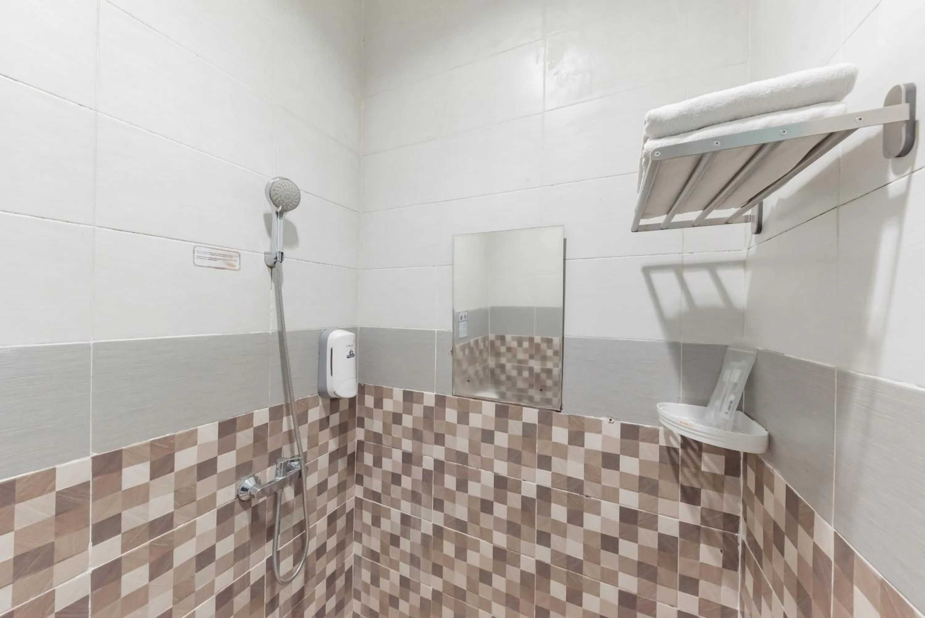 Bathroom in Urbanview Darmo Residence Bandung