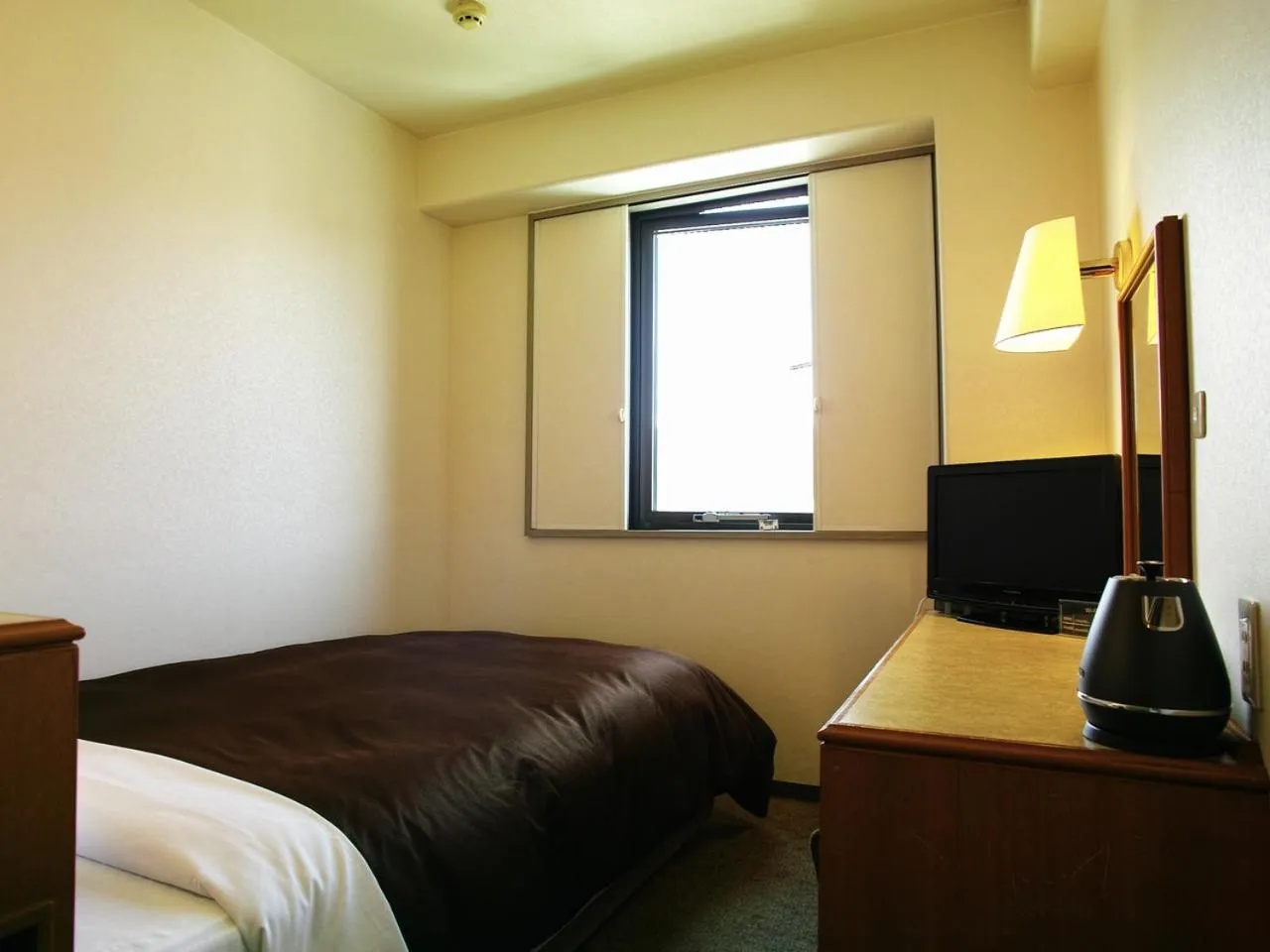 Bed in Tourist Hotel Hitachi