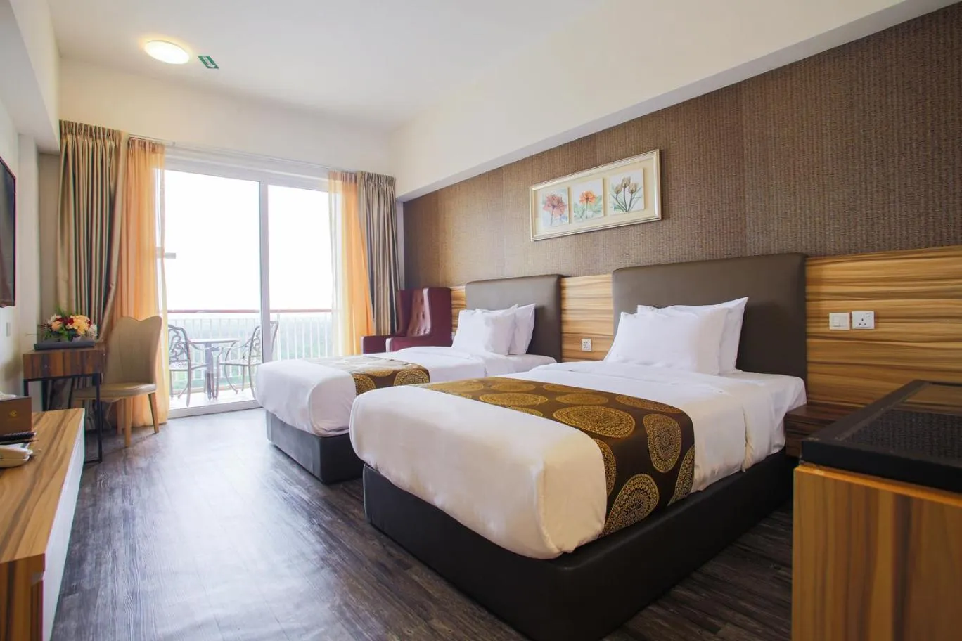 Bed in AMERALD RESORT HOTEL DESARU