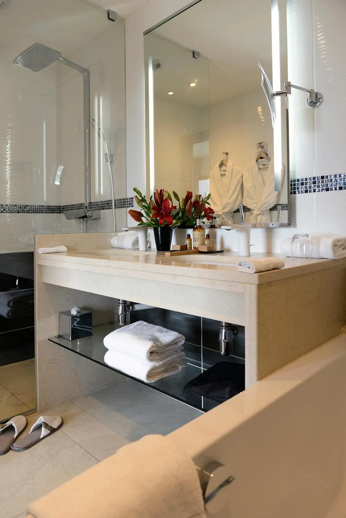 Shower in Kyriad Prestige Lyon Est - Saint Priest Eurexpo Hotel and SPA