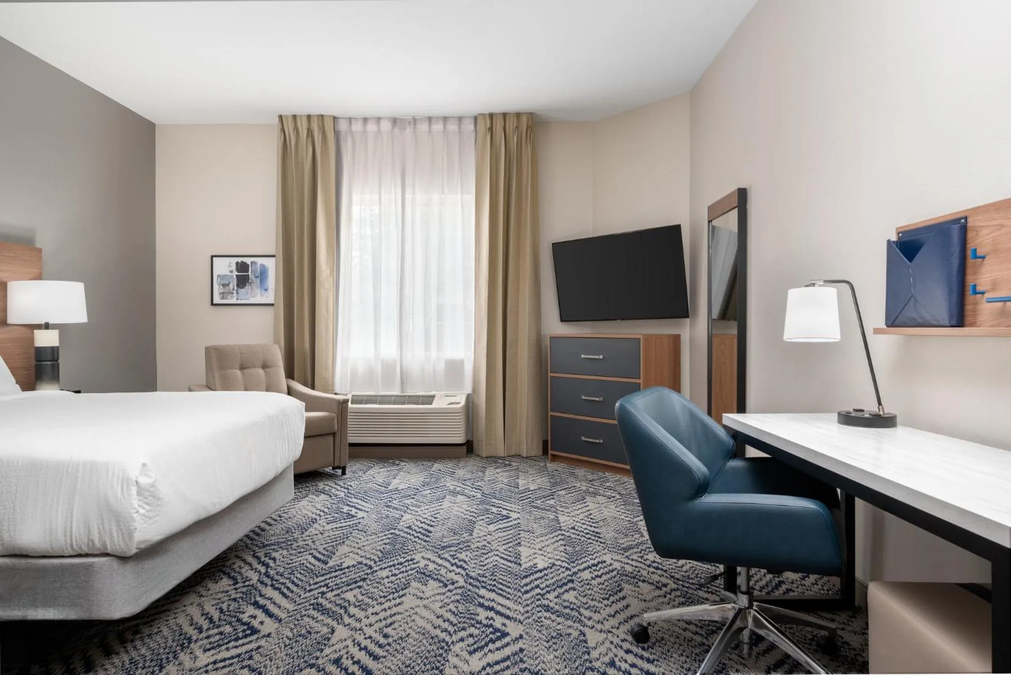 Photo of the whole room, Bed in Candlewood Suites Mooresville Lake Norman,NC by IHG