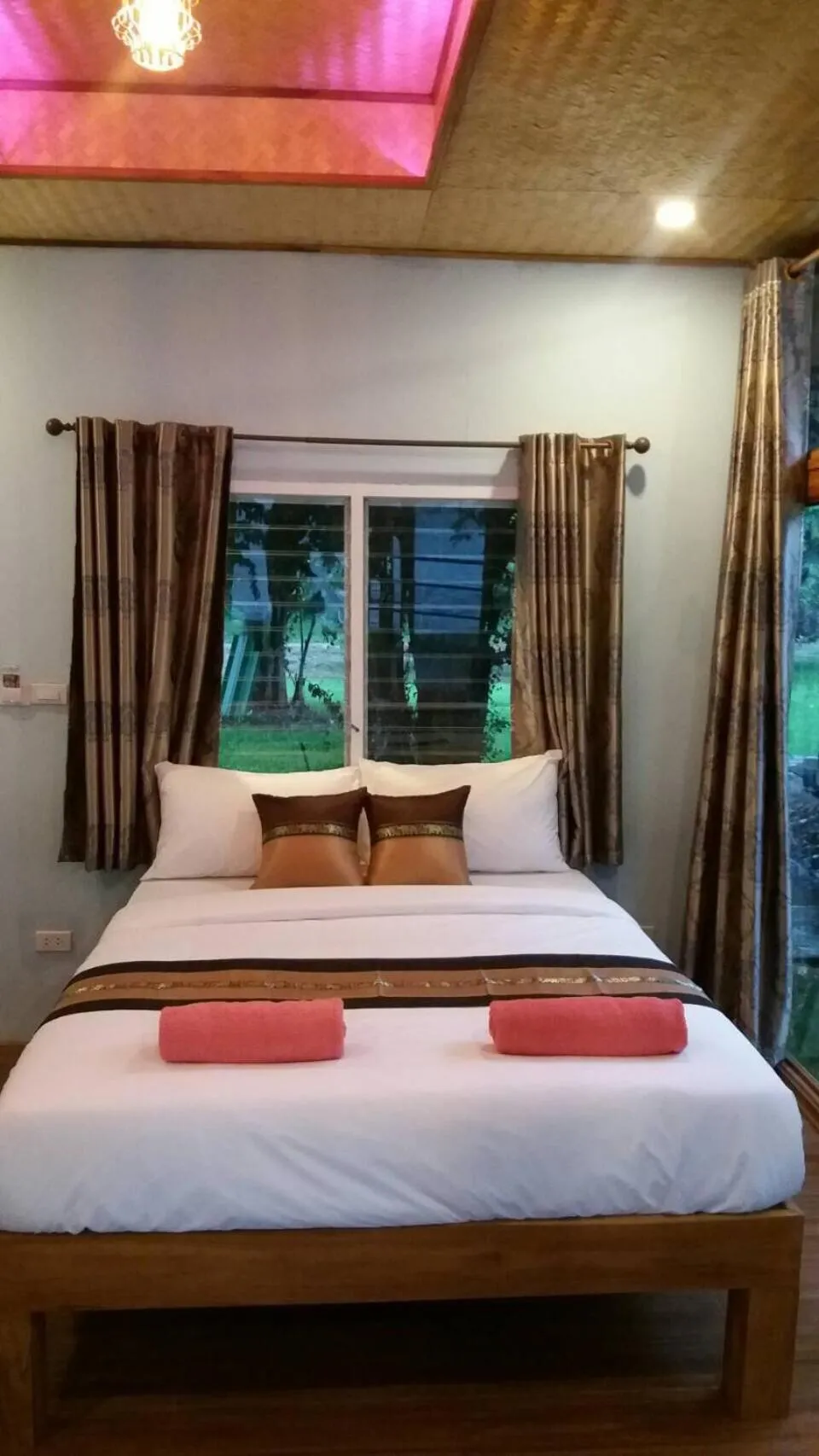 Bed in Kodaun River Kwai Resort