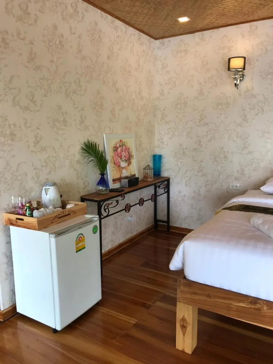 Bed in Kodaun River Kwai Resort