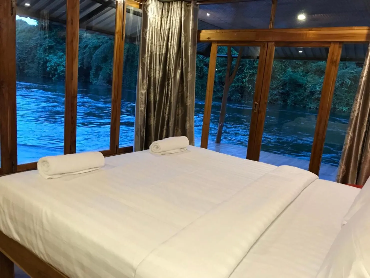 Bed in Kodaun River Kwai Resort