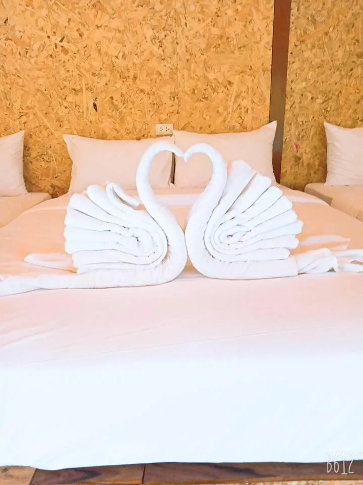 Bed in Kodaun River Kwai Resort