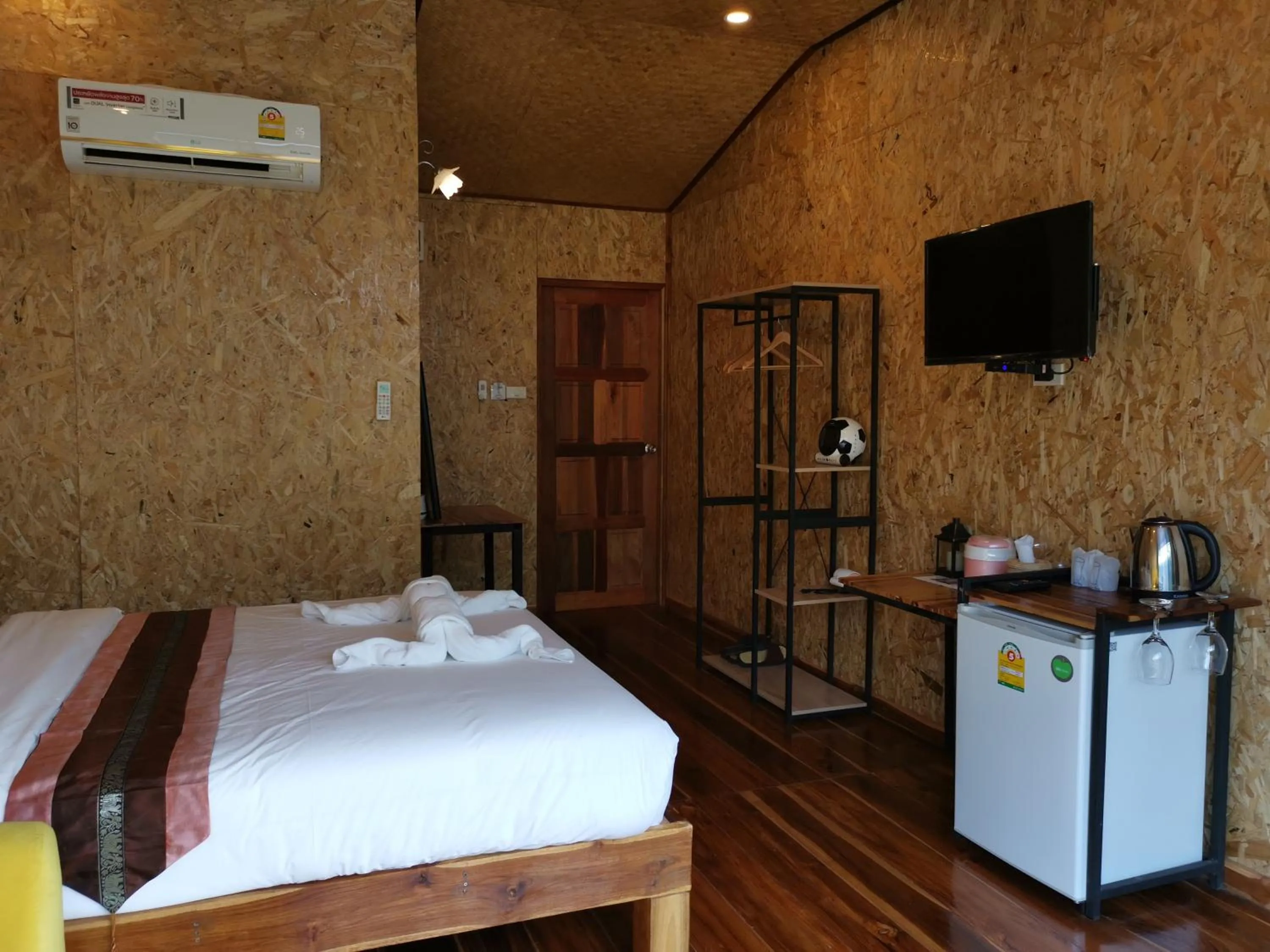 Bed in Kodaun River Kwai Resort