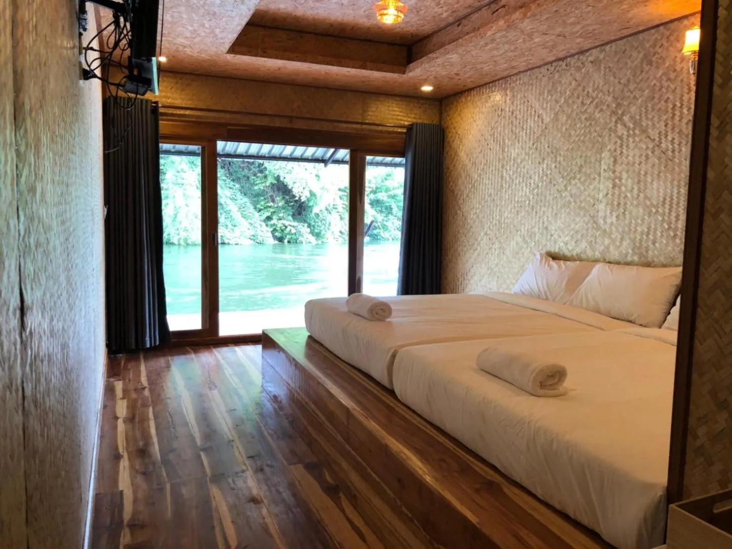 Bed in Kodaun River Kwai Resort