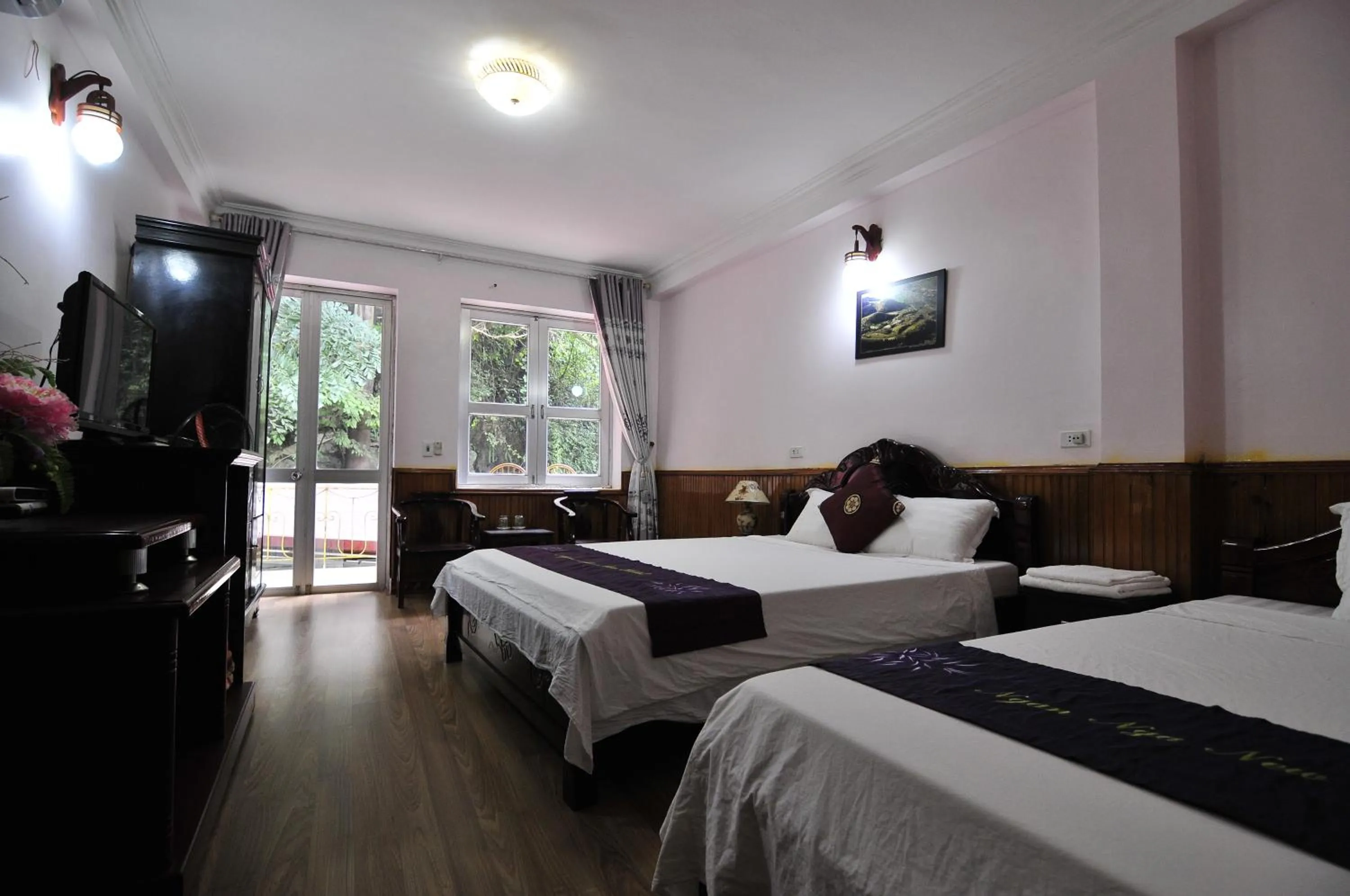 Bed in Ngan Nga Bac Ha Hotel