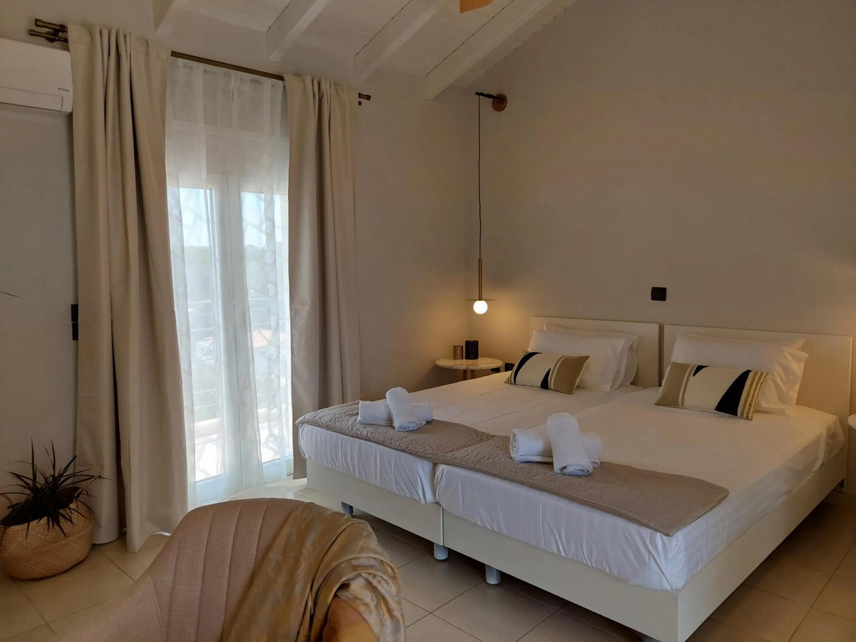 Bed in Socrates Apartments