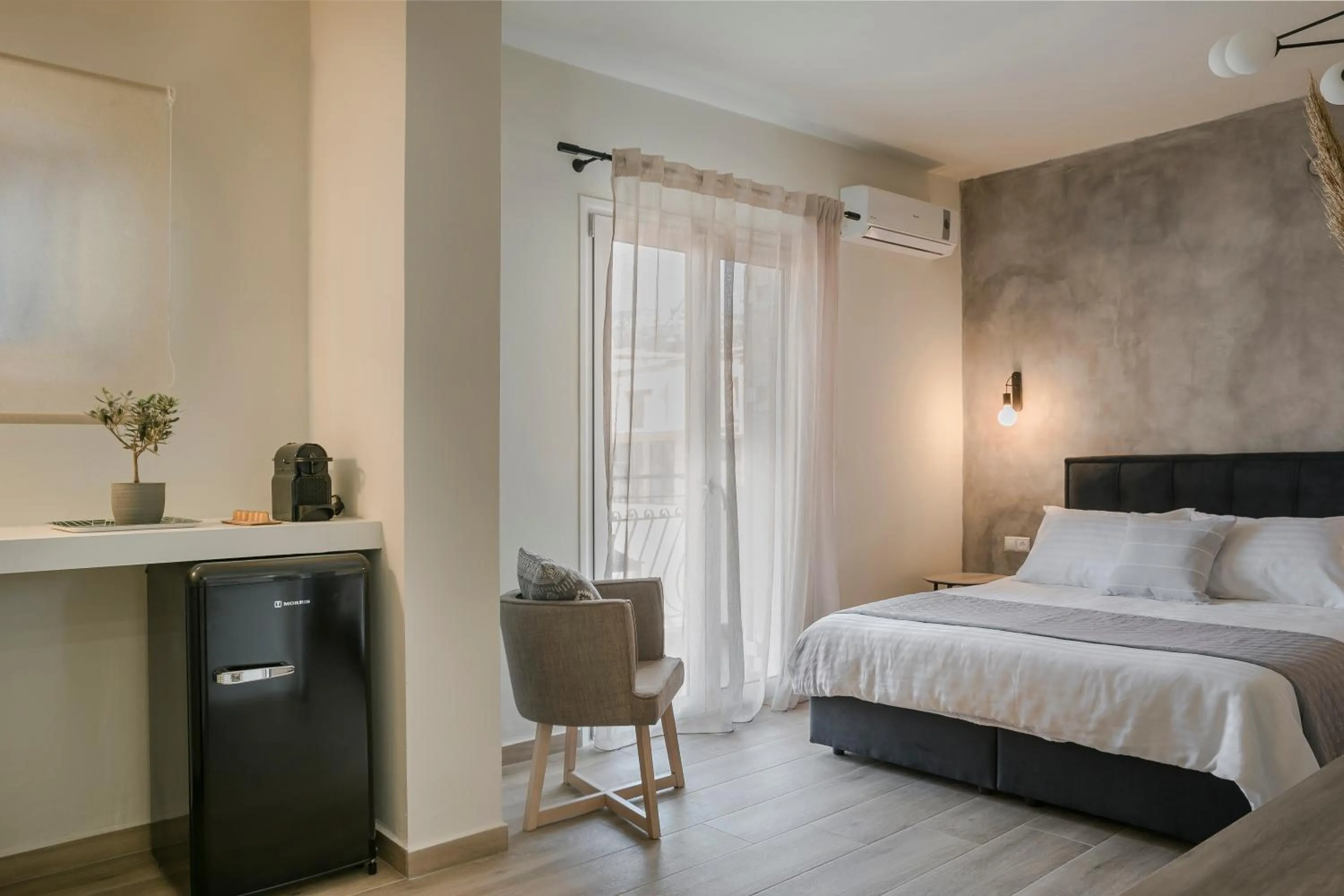 Bed in Socrates Apartments