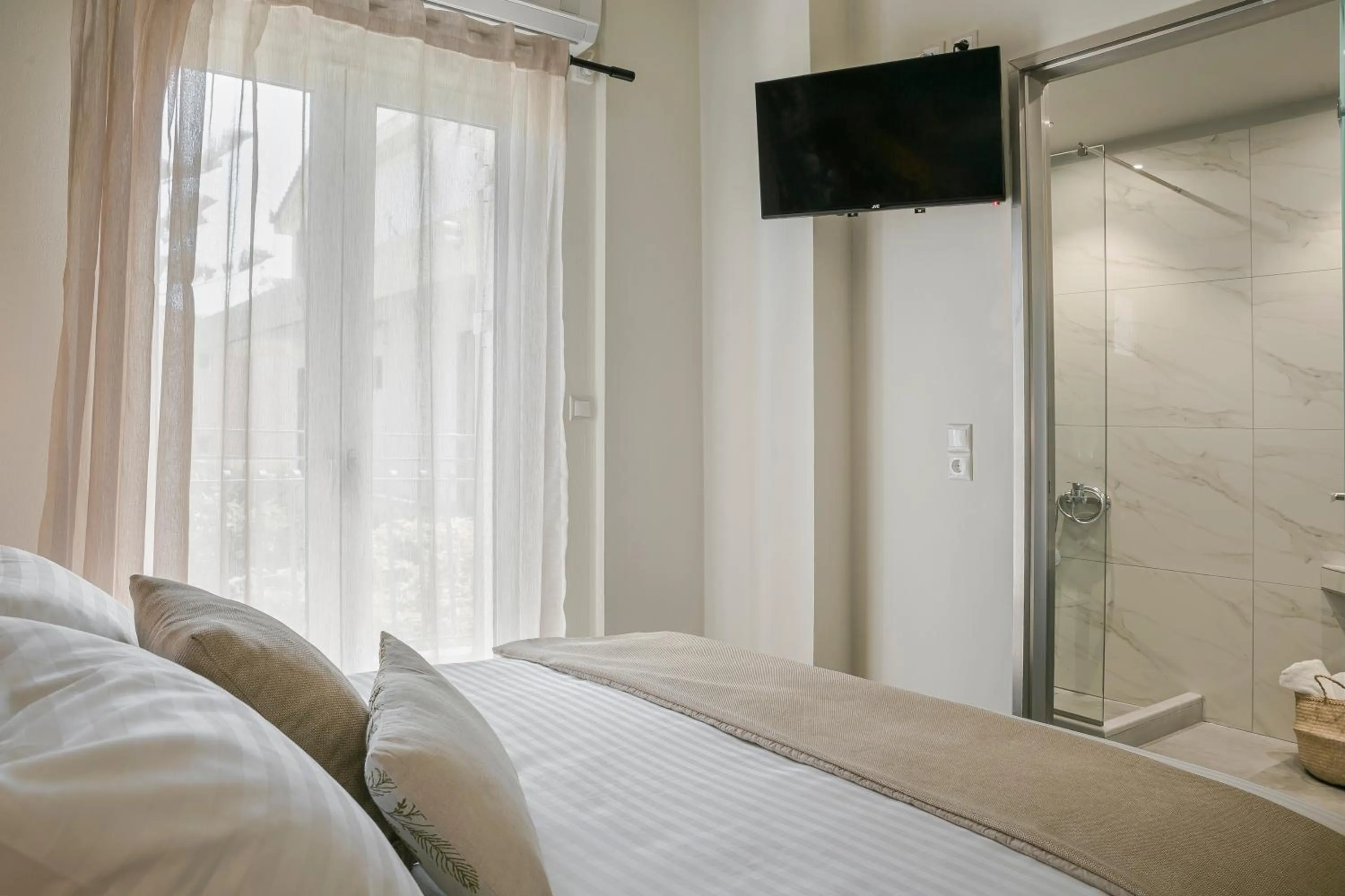 Bed in Socrates Apartments