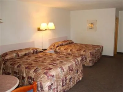 Bed in Chinook Motel