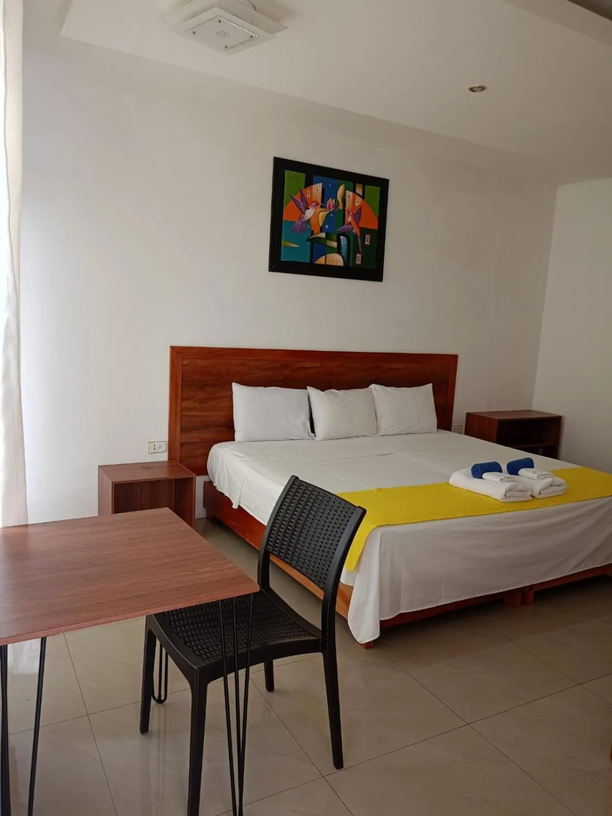 Bed in Galápagos Isabela Hotel Loja