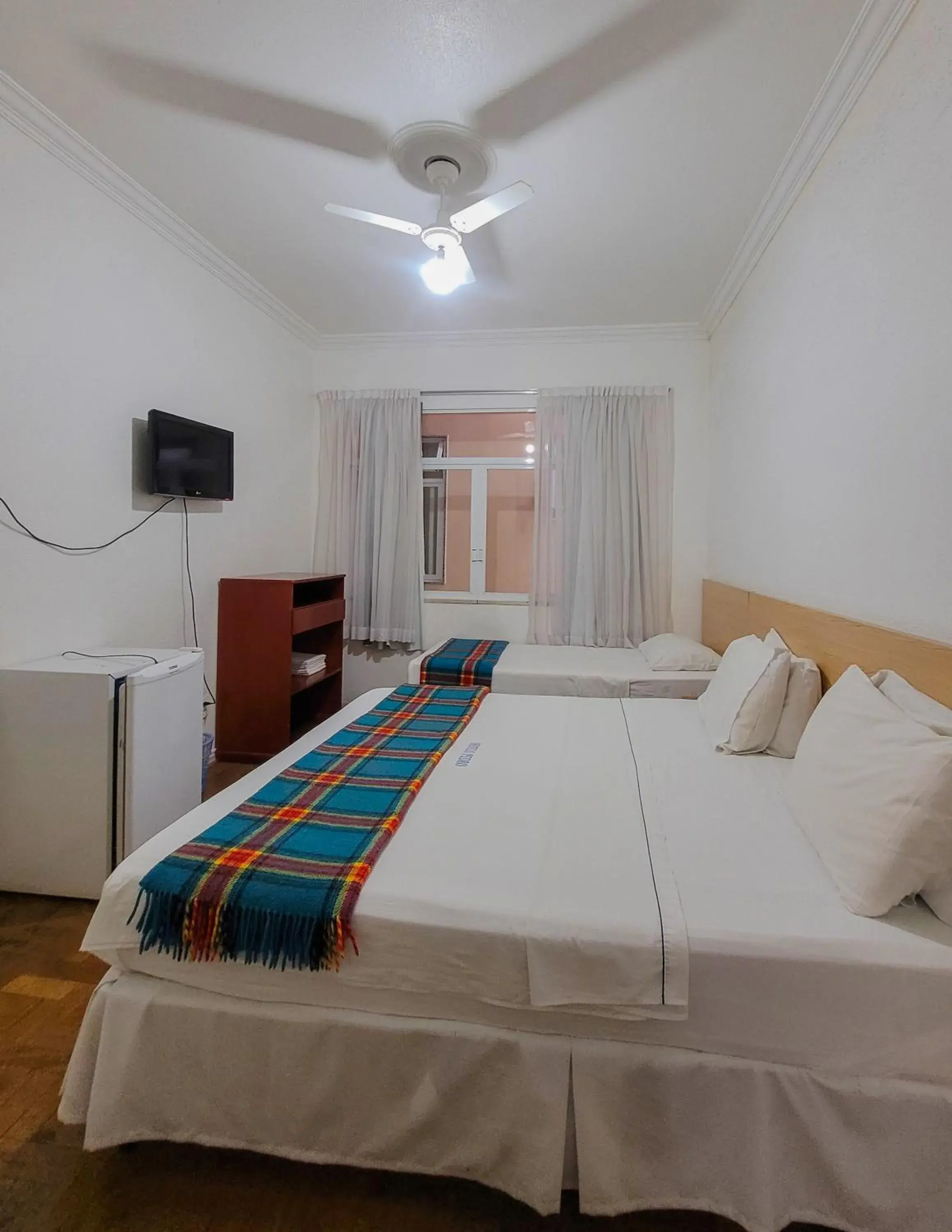 Standard Triple Room with Private Bathroom in Dom Pedro Hotel Standard Triple Room with Private Bathroom in Dom Pedro Hotel