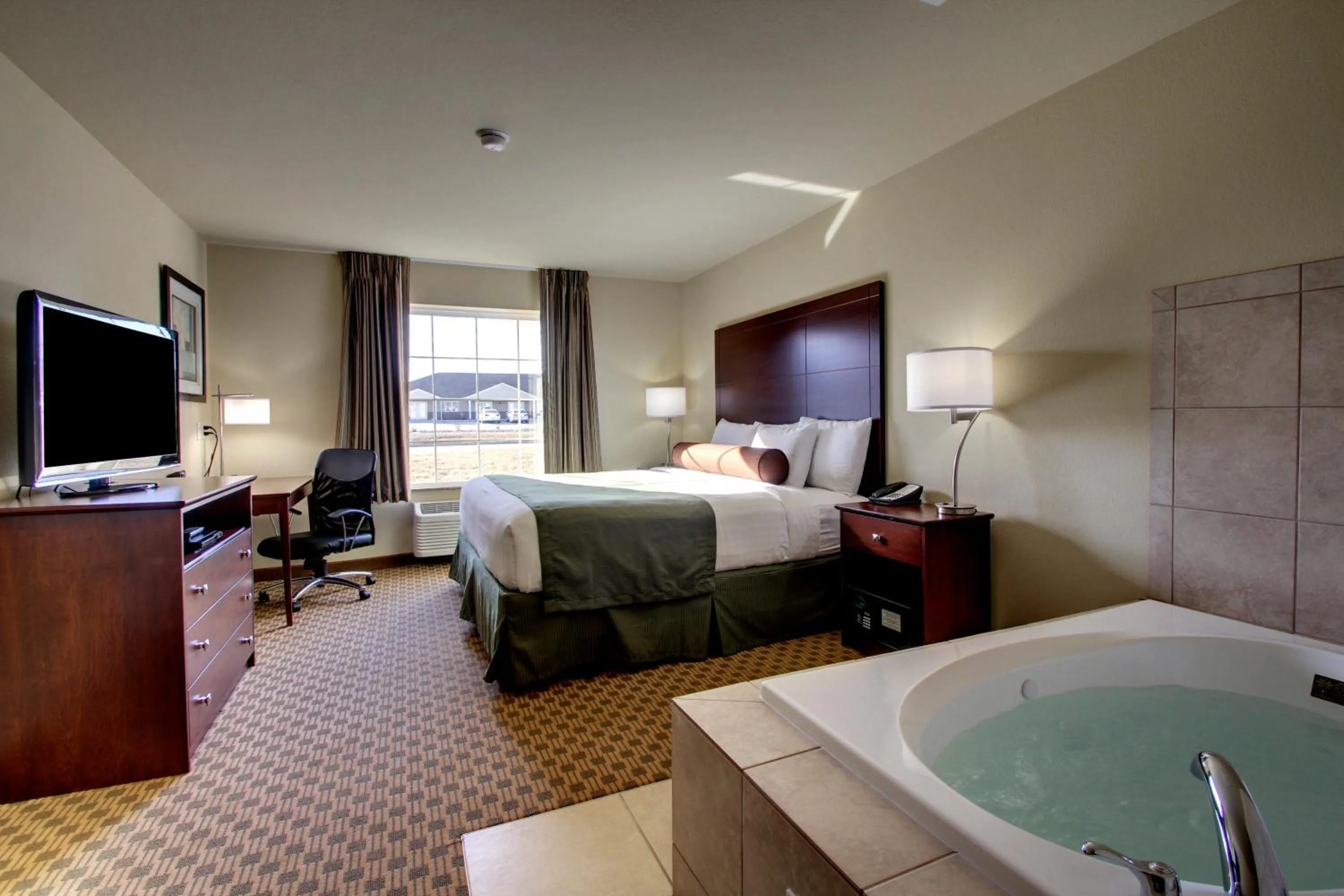 Photo of the whole room, Bed in Cobblestone Inn & Suites - Carrington