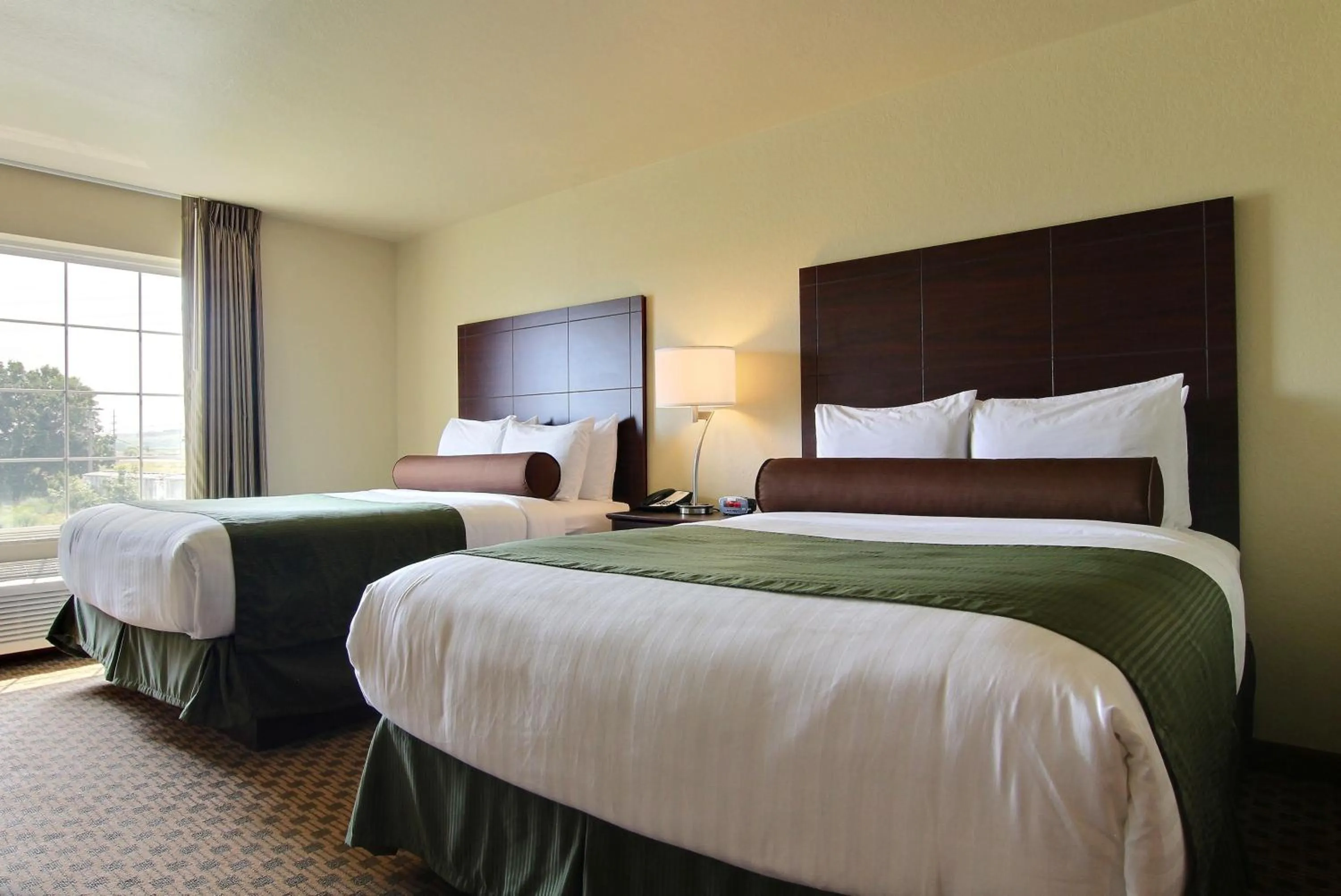 Bedroom, Bed in Cobblestone Inn & Suites - Carrington