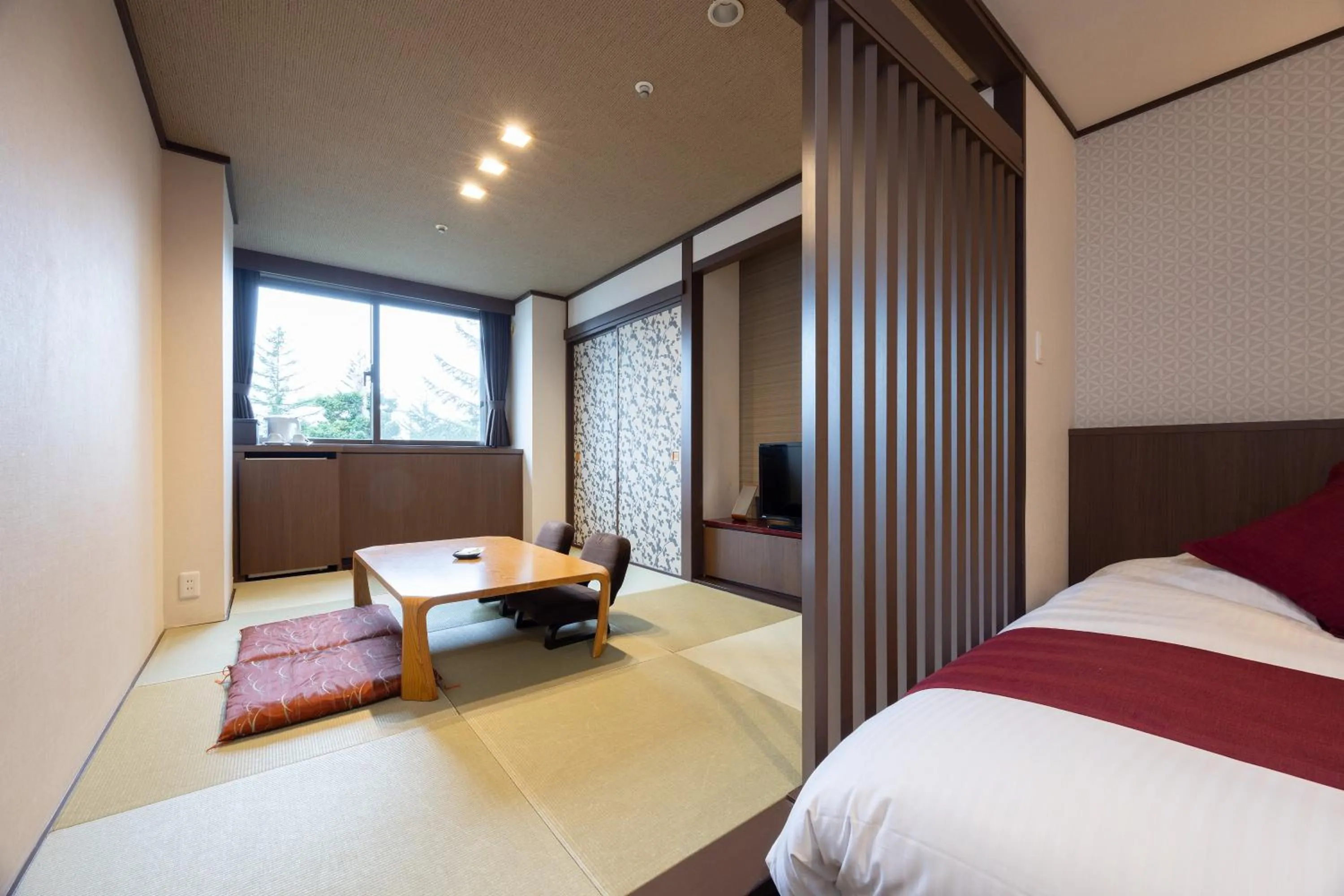 Bed in Hotel Kanronomori