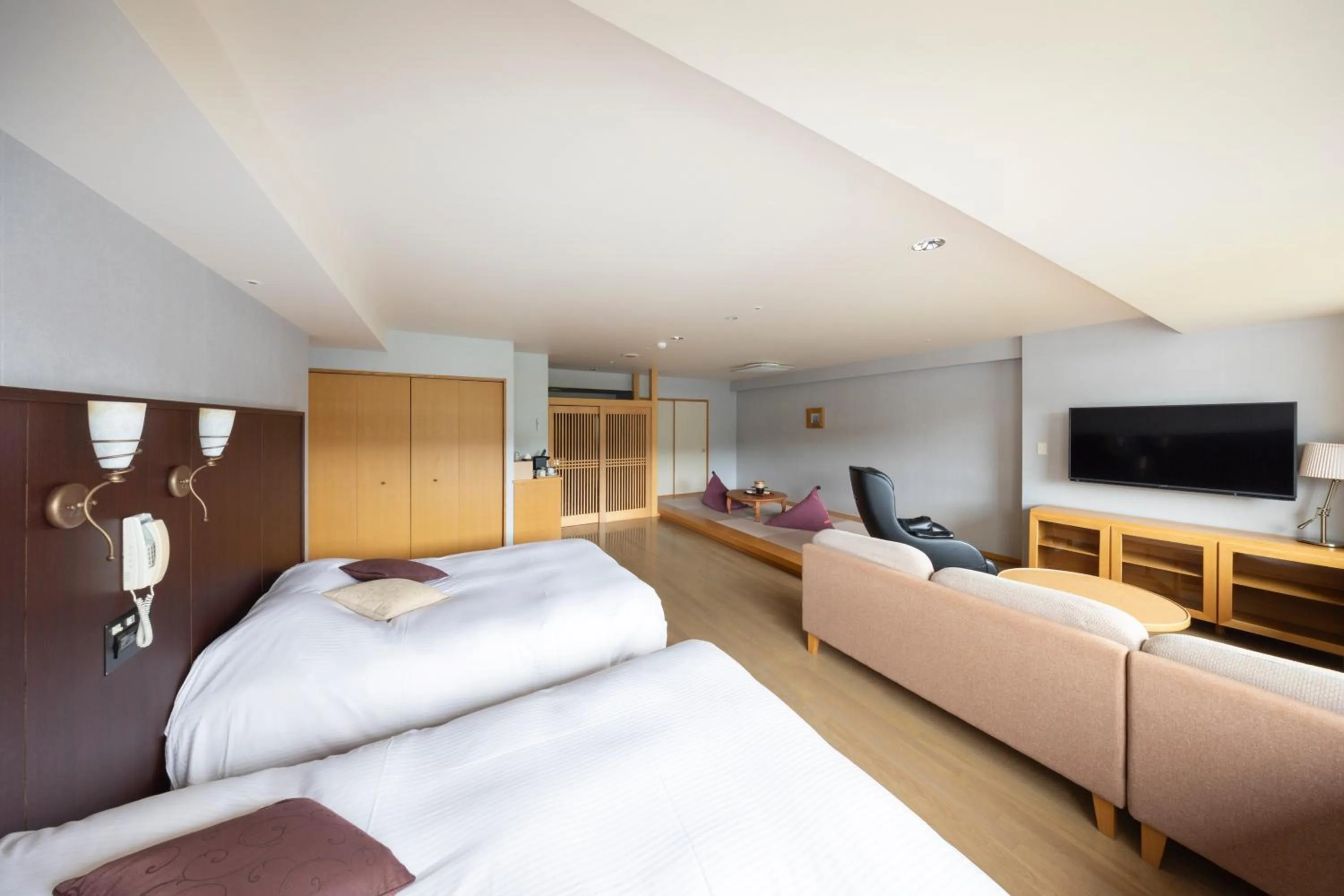 Bed in Hotel Kanronomori