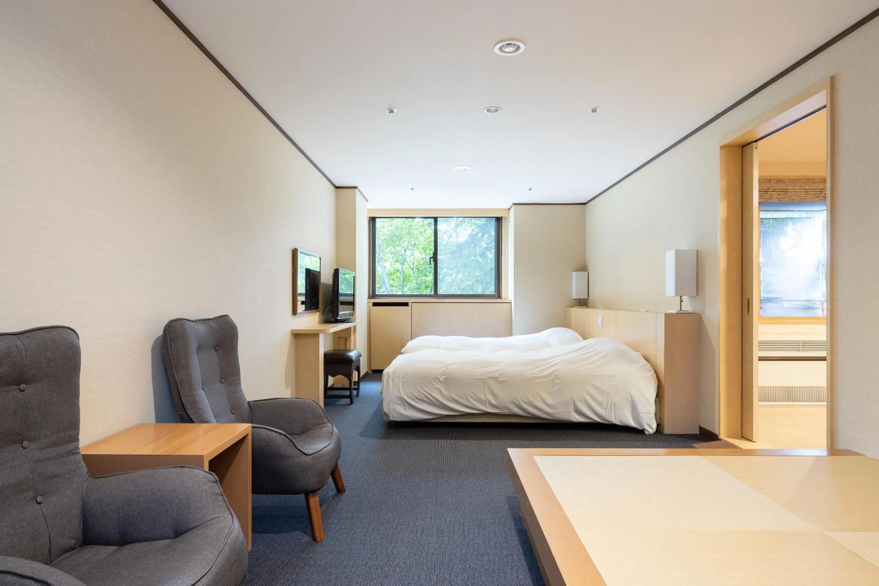 Bed in Hotel Kanronomori