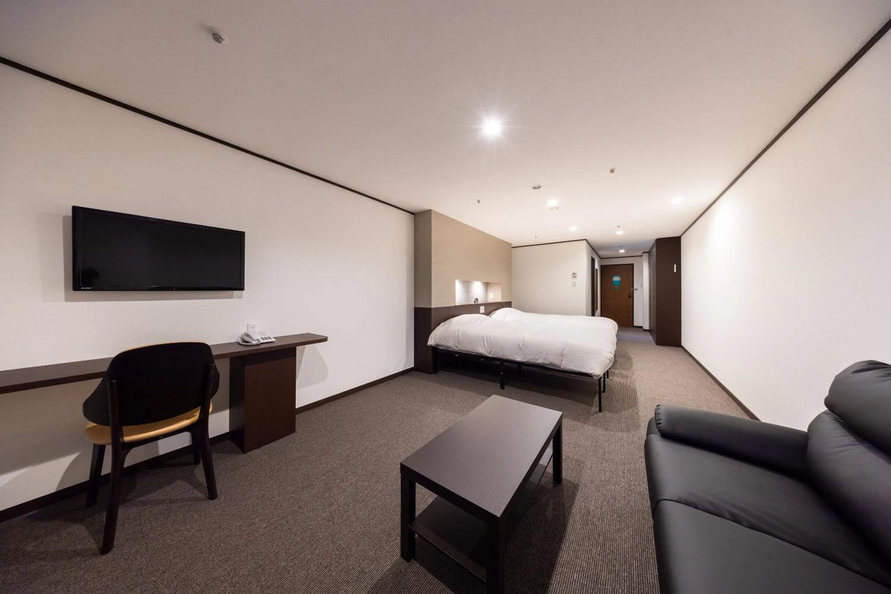 Bed in Hotel Kanronomori