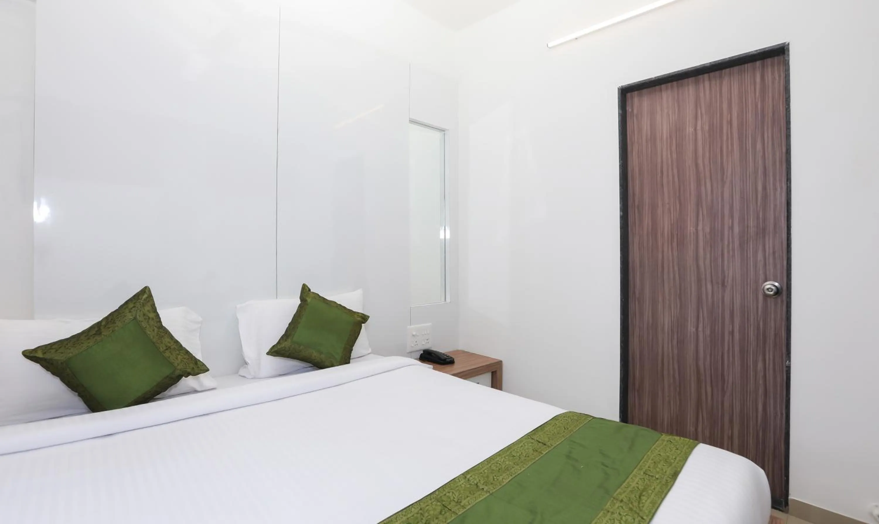 Bedroom, Bed in Treebo Sapphire Studio