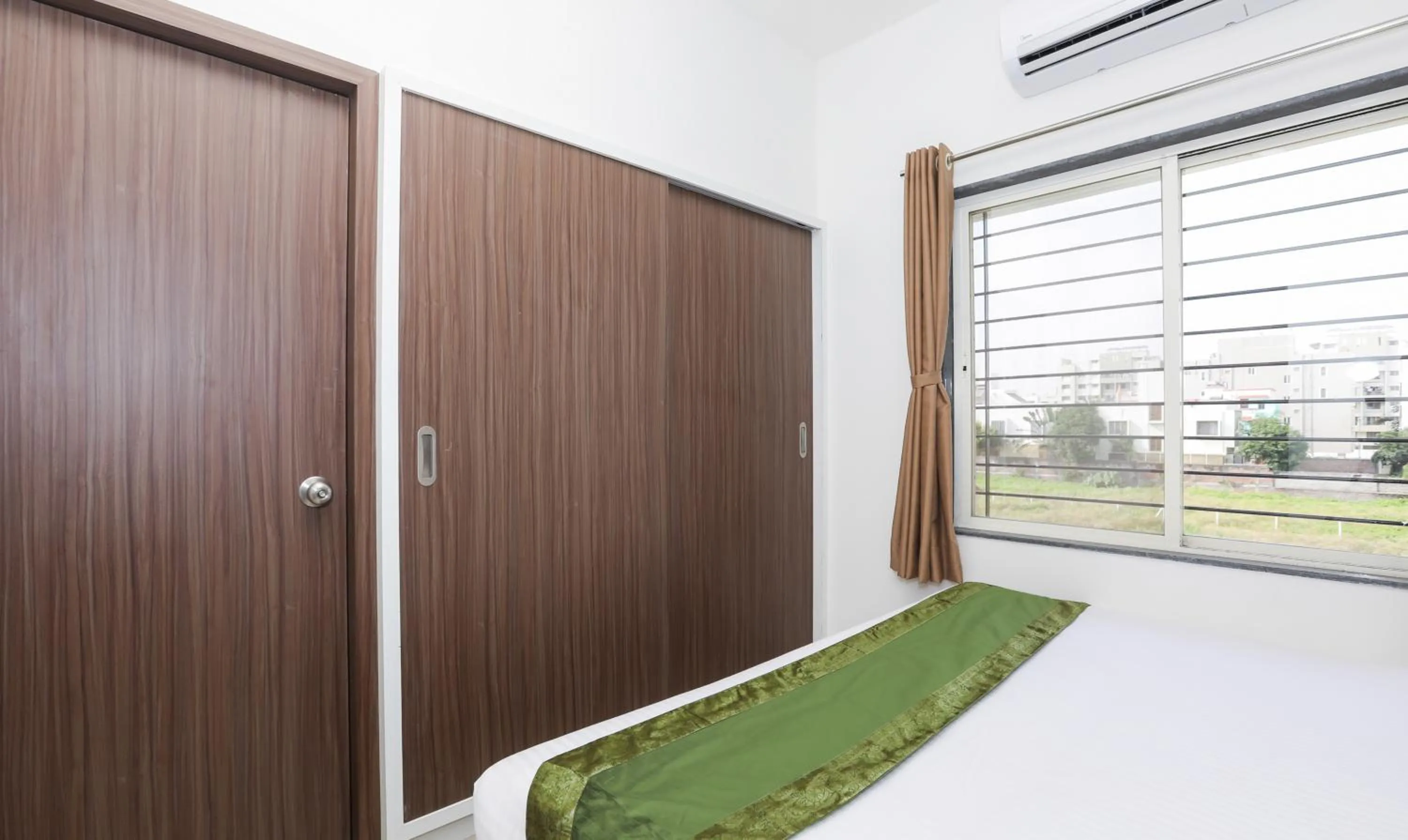 Bedroom, Bed in Treebo Sapphire Studio