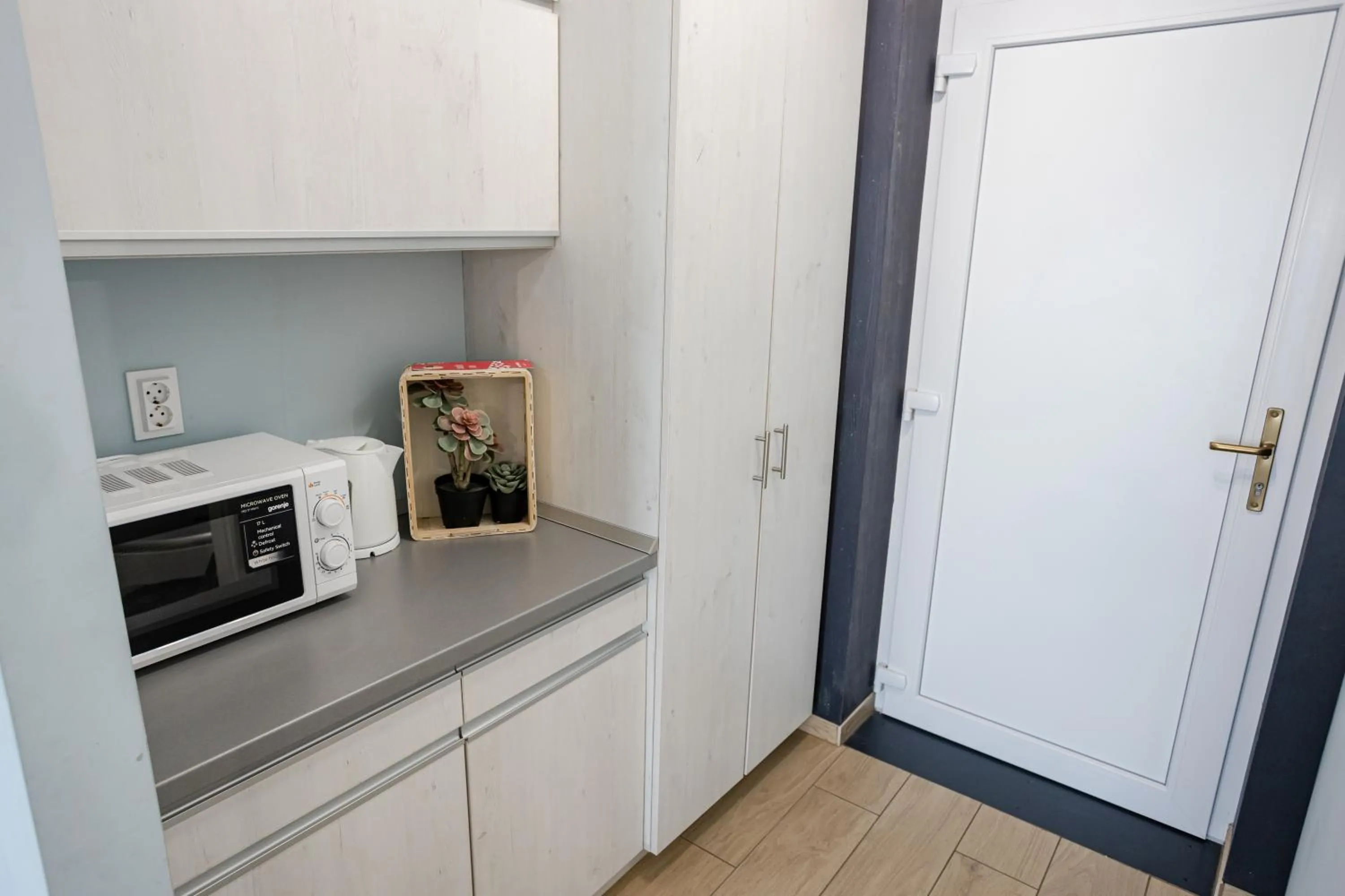 Kitchen or kitchenette in Halfarock Vízi-Erdei Apartmanház