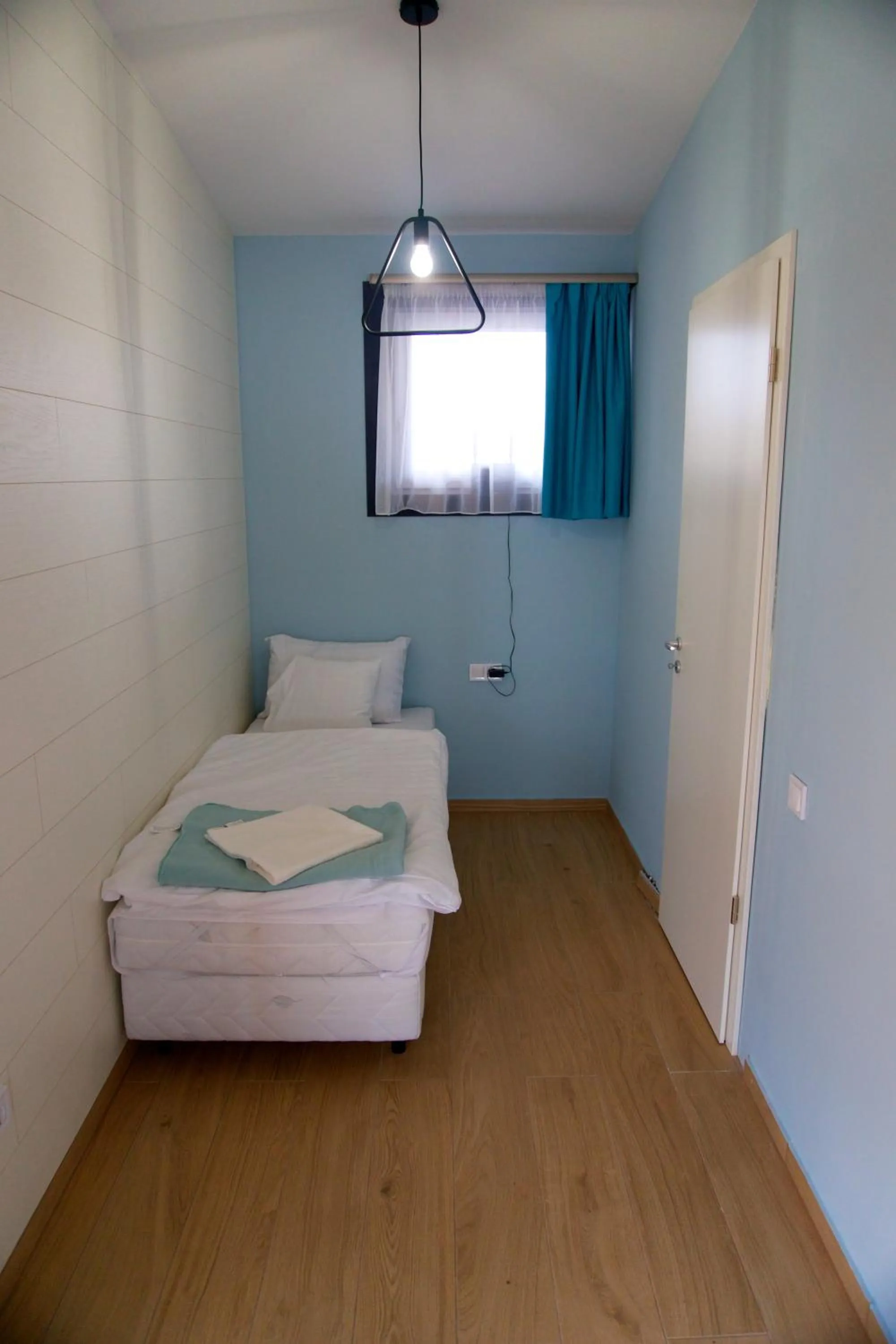 Bed in Halfarock Vízi-Erdei Apartmanház