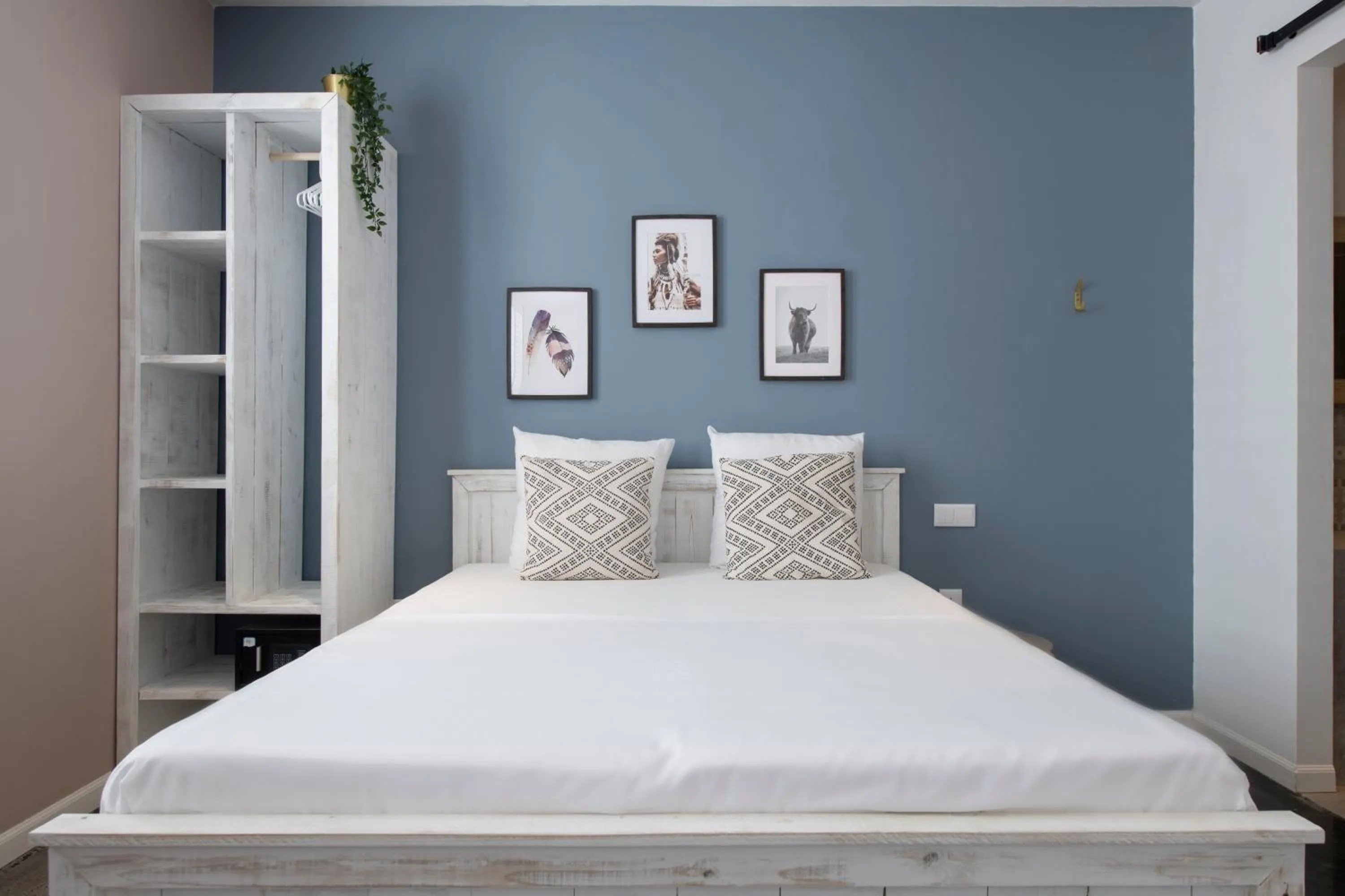 Bed in BOHO Bohemian Boutique Hotel