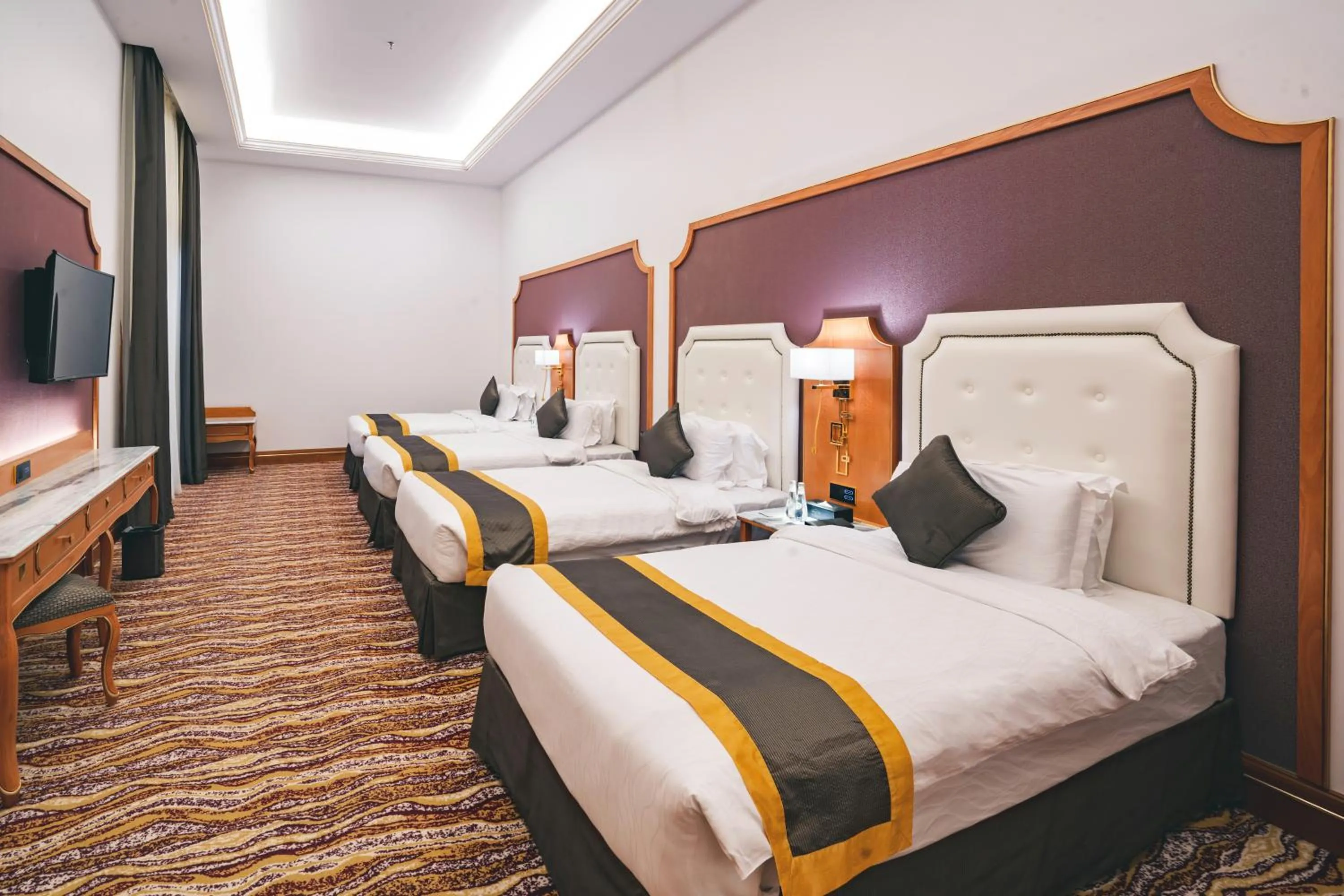 Bed in Iridium Hotel