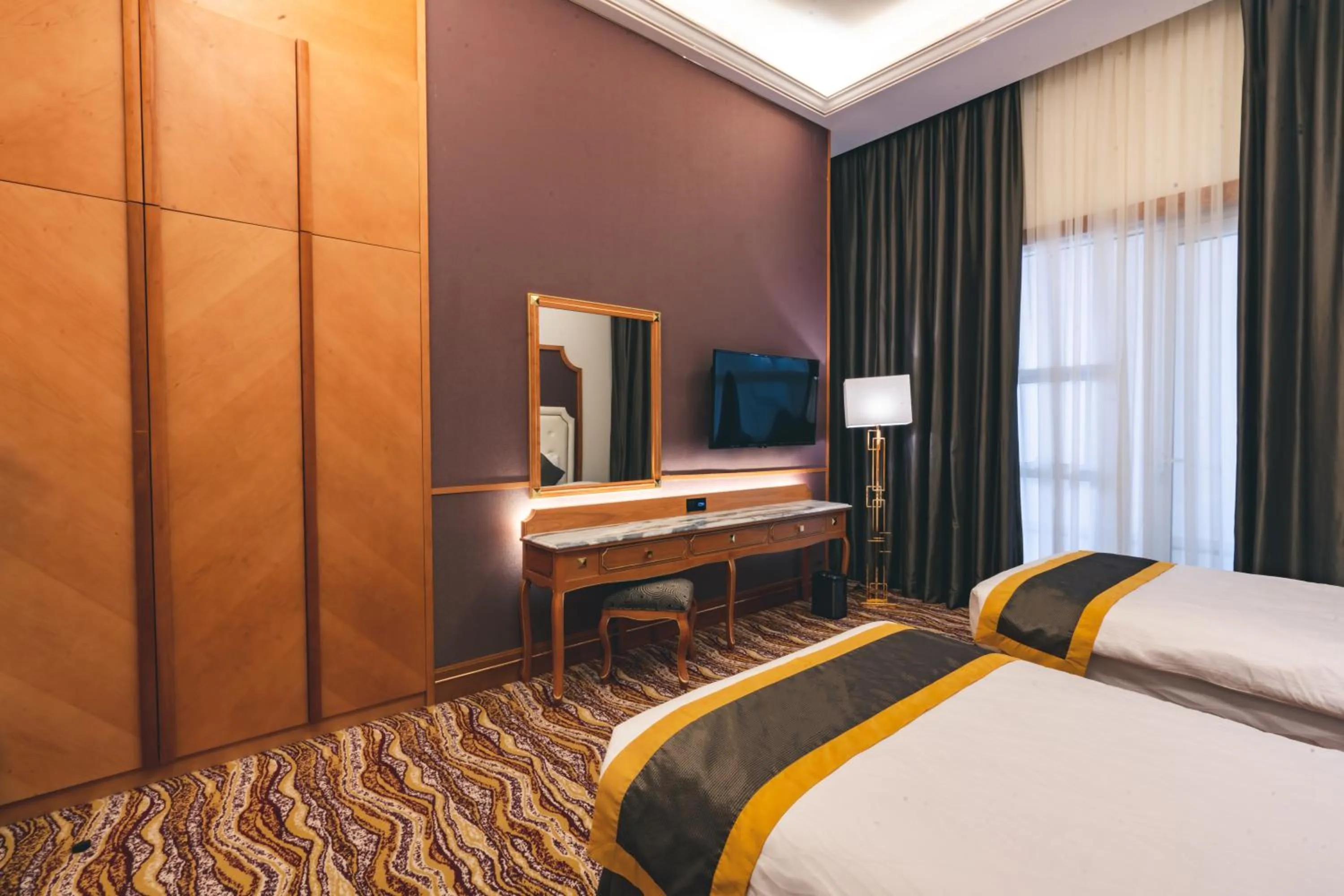 Bed in Iridium Hotel