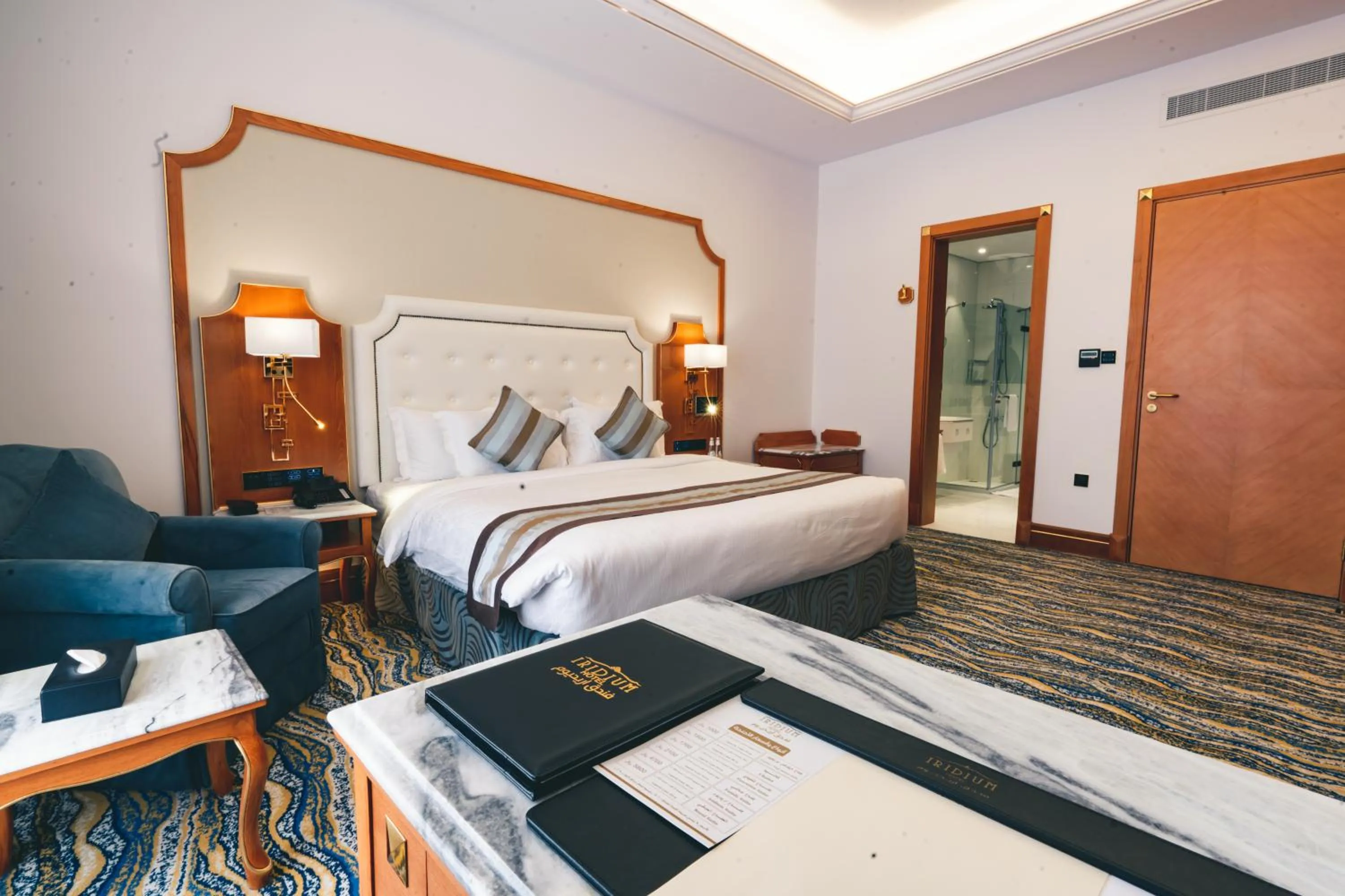 Bed in Iridium Hotel