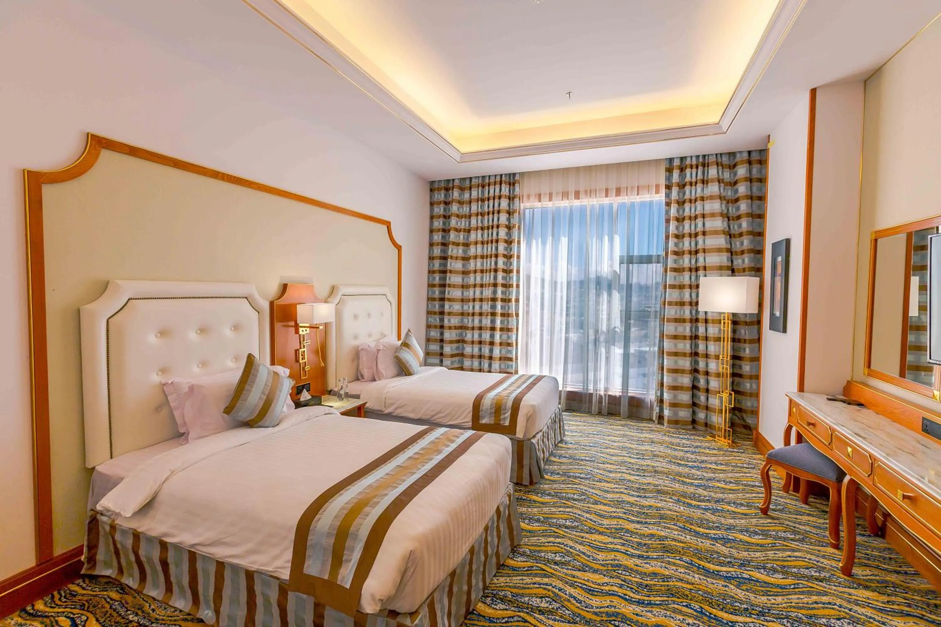 Bed in Iridium Hotel