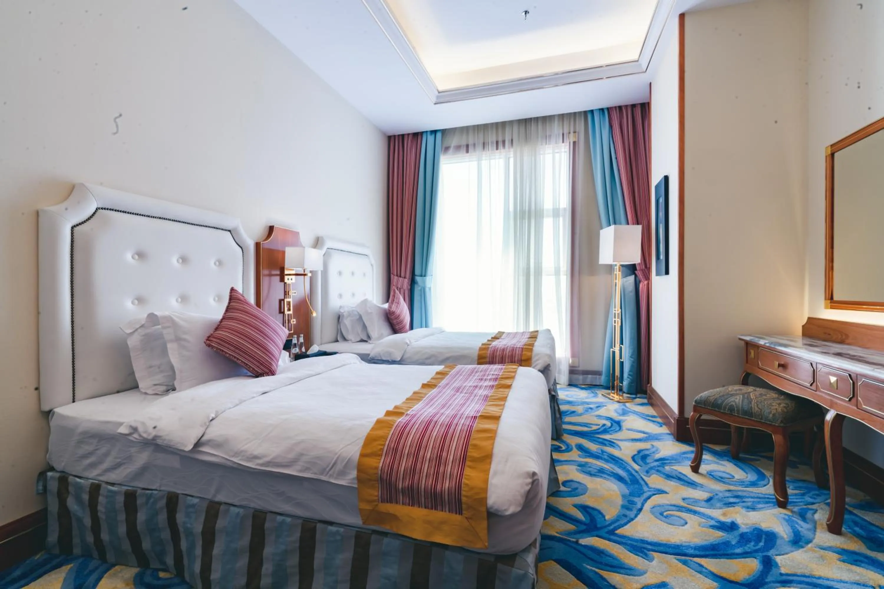 Bed in Iridium Hotel