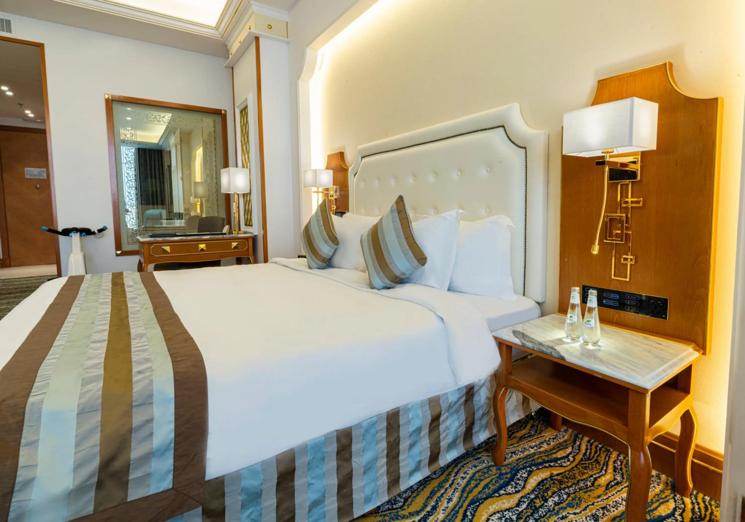 Bed in Iridium Hotel