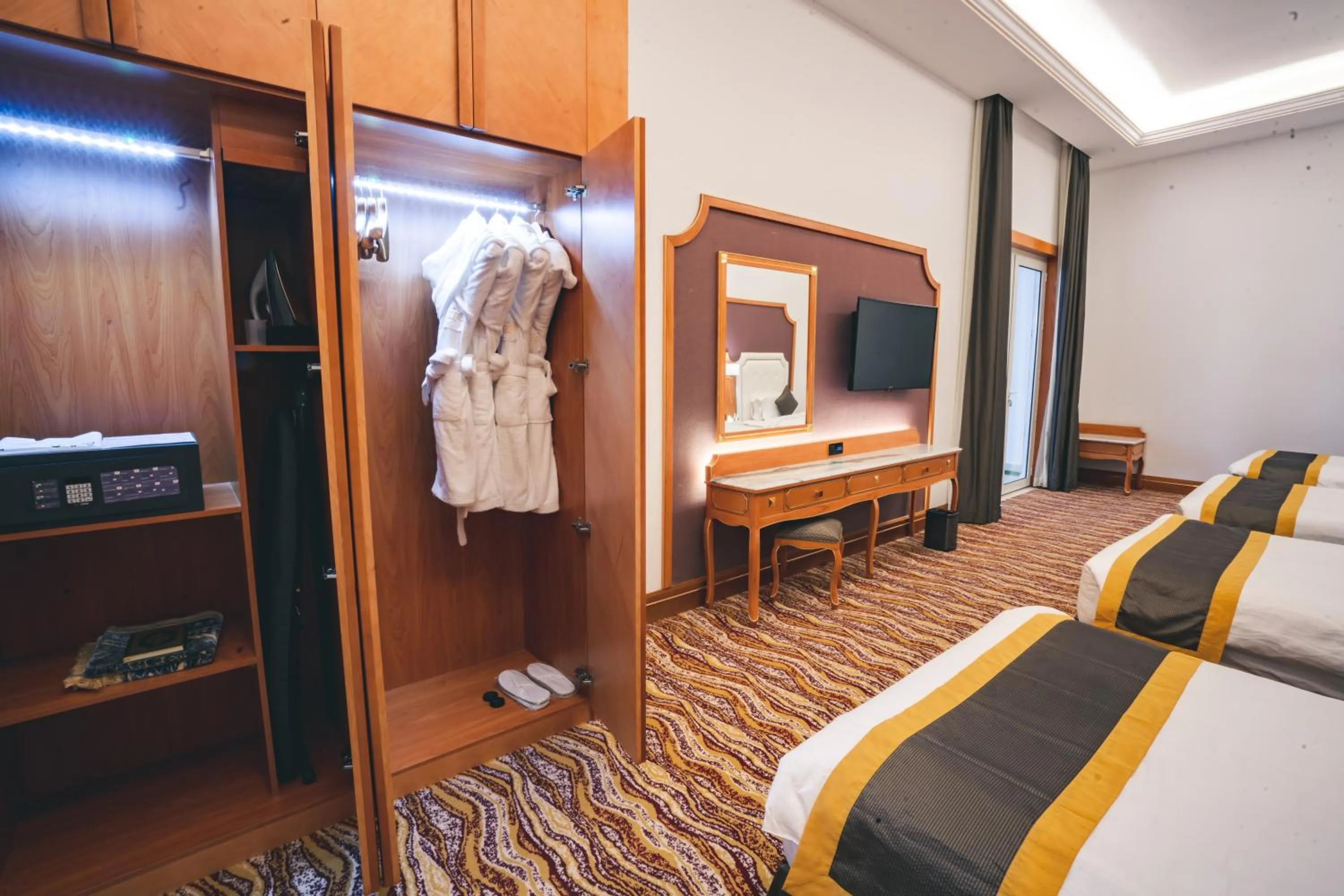 Bed in Iridium Hotel