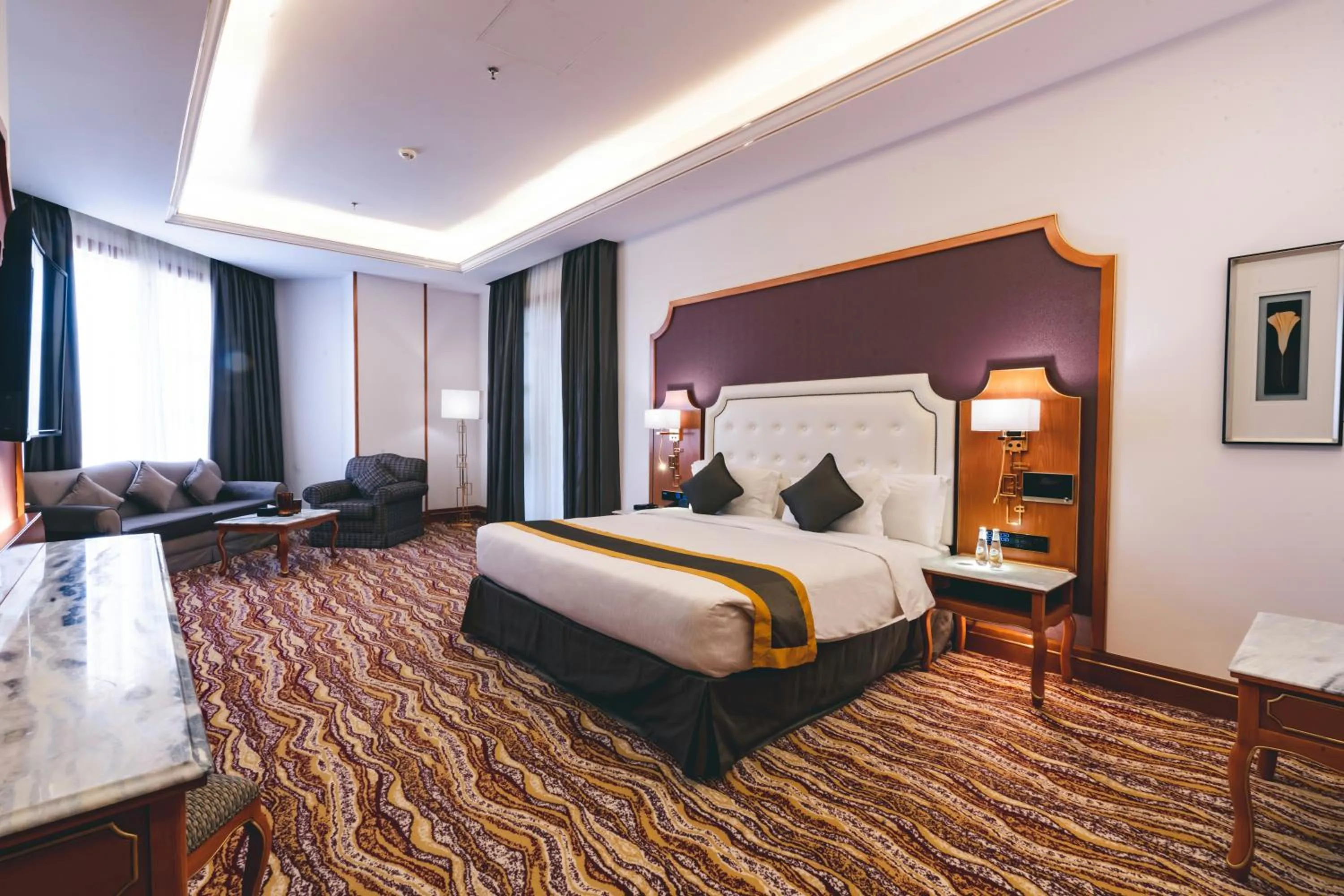 Bed in Iridium Hotel