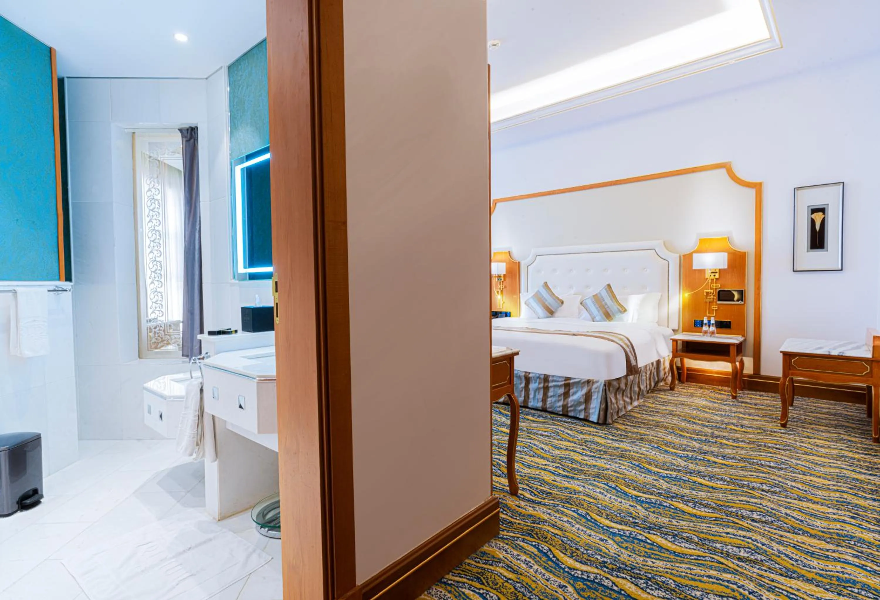 Bed in Iridium Hotel