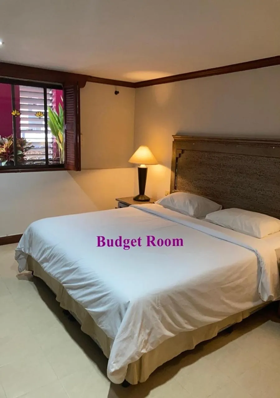 Bed in Le Tanjong House