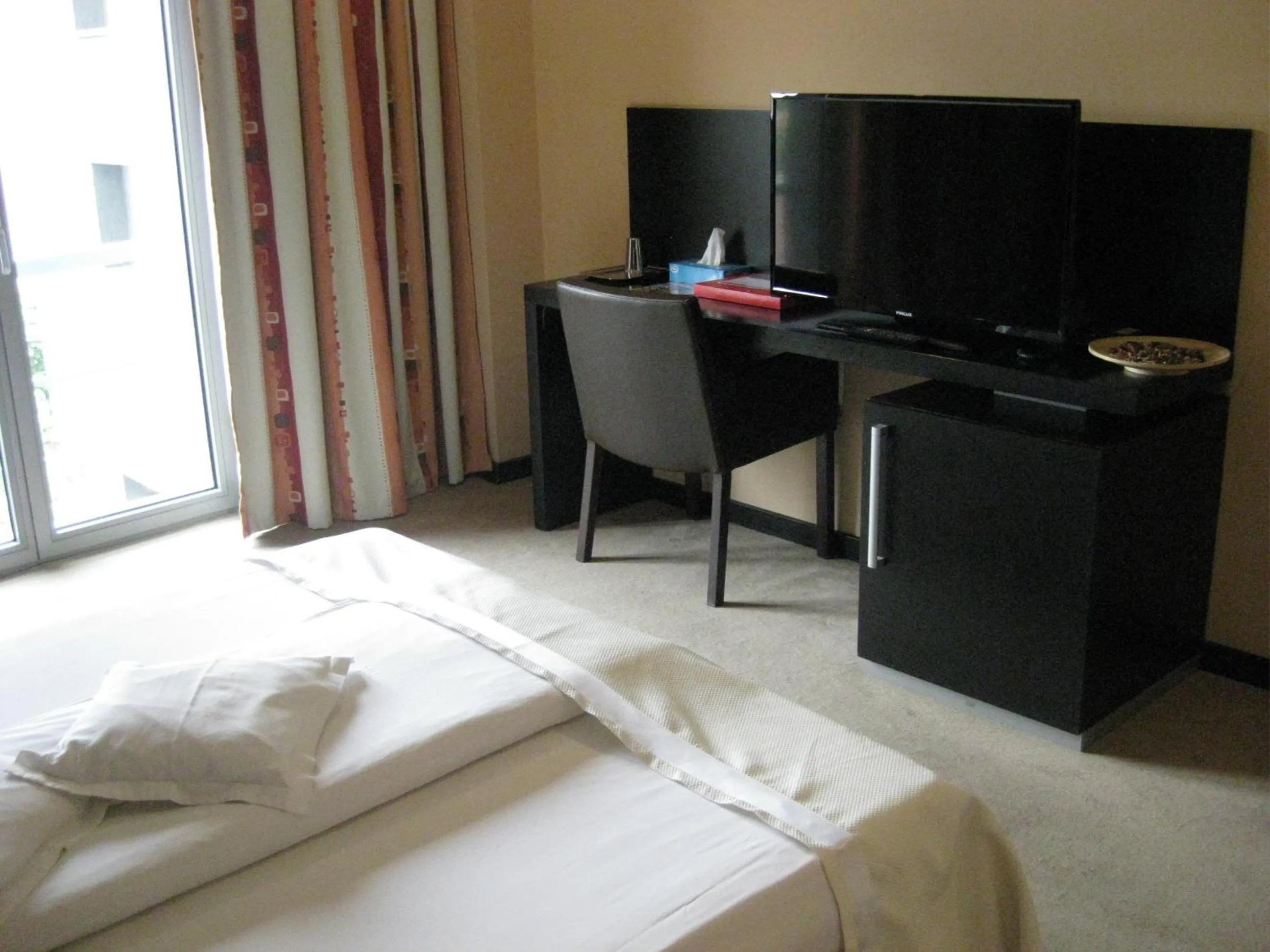 TV and multimedia, Bed in Hotel Delpack