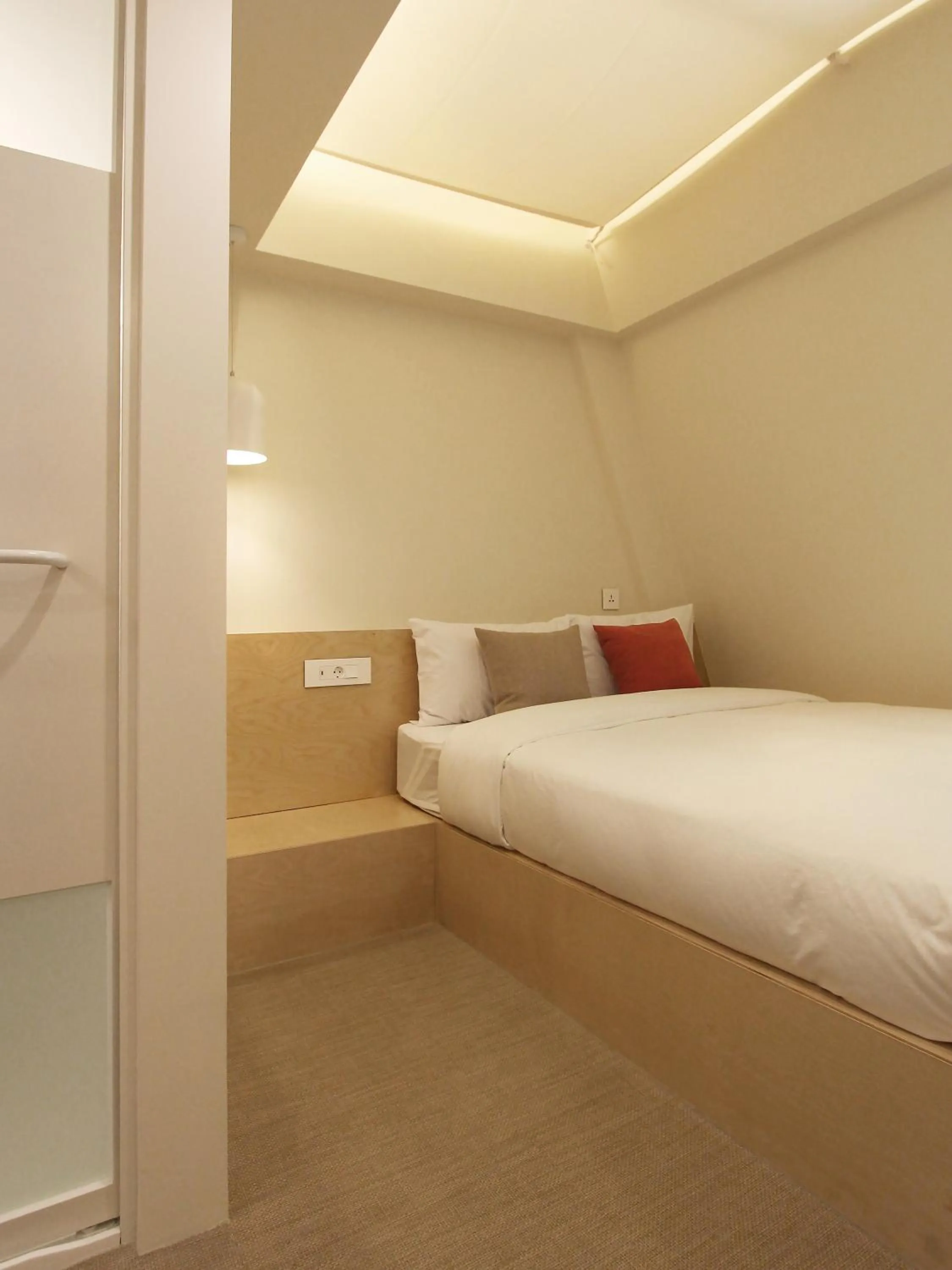 Bed in Tong Tong Petit Hotel