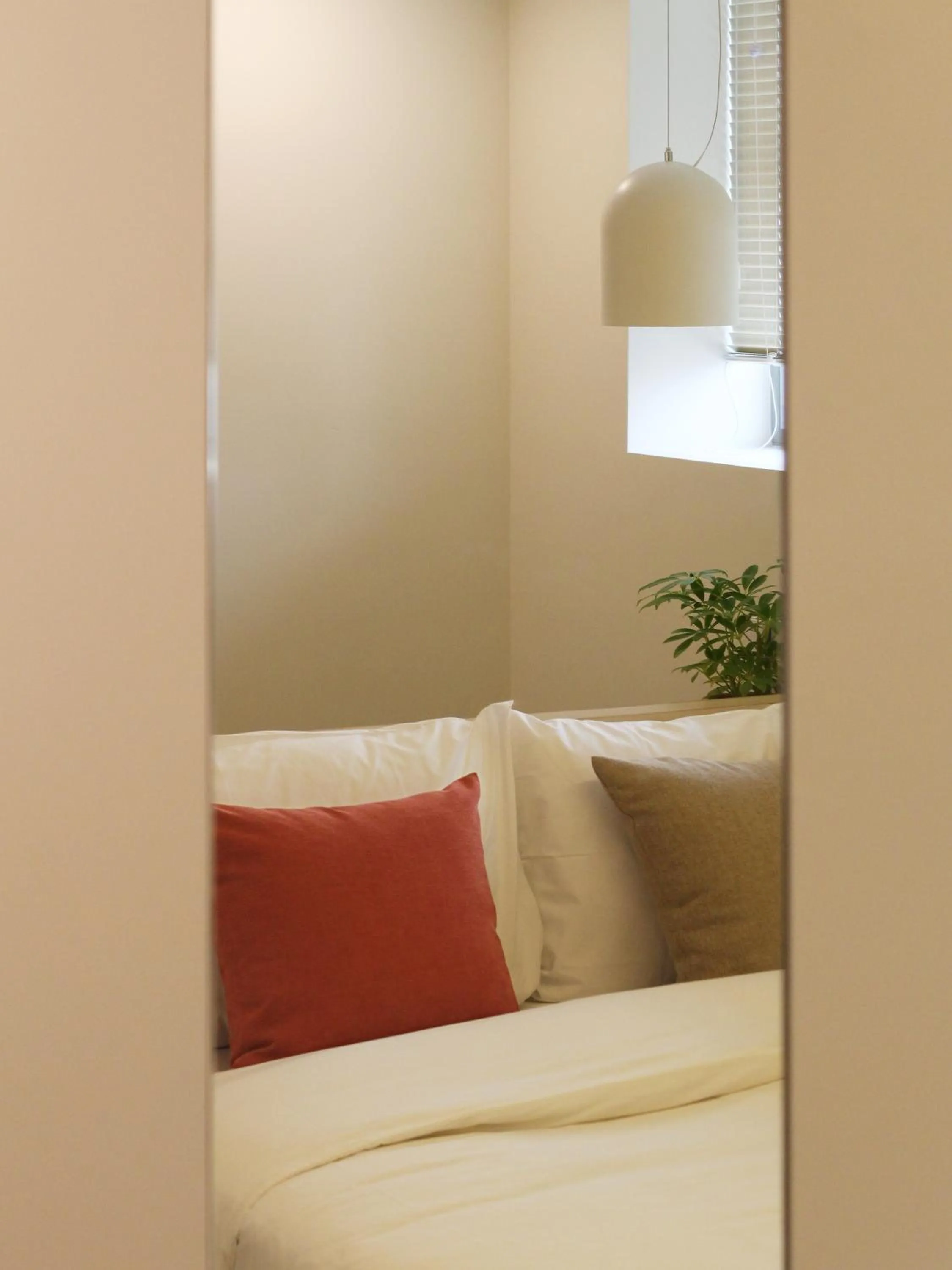 Bed in Tong Tong Petit Hotel