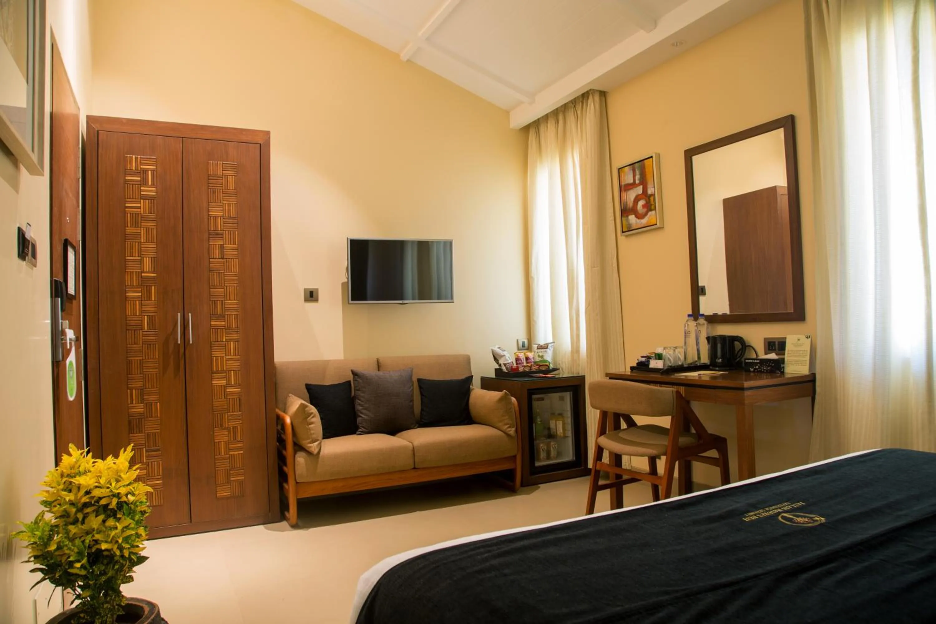 Bedroom in Fazlani Natures Nest - The Wellness Retreat