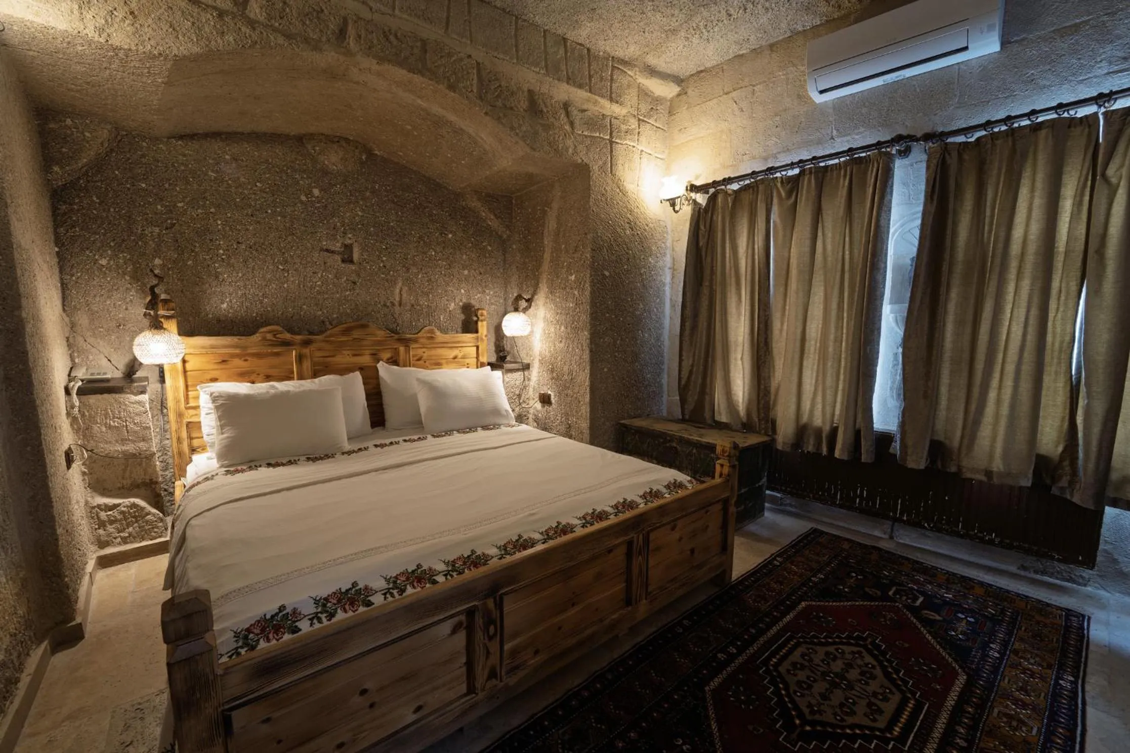 Bed in Grand Cave Suites