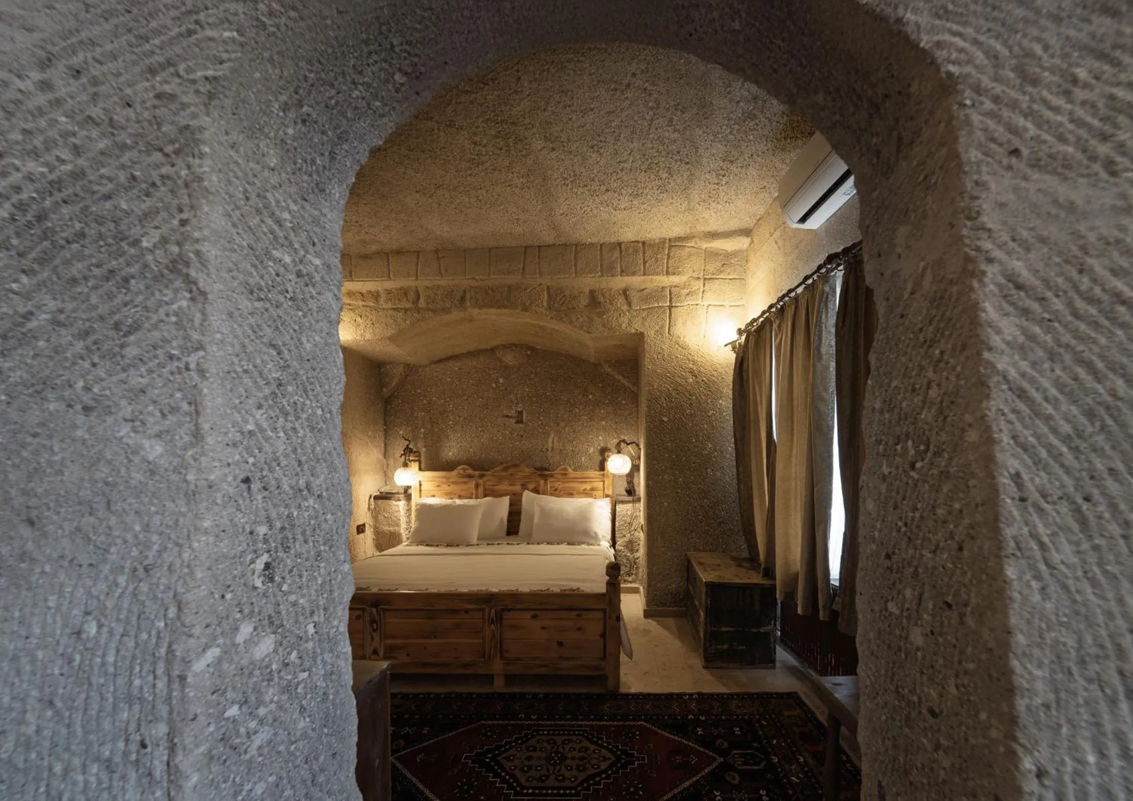 Bed in Grand Cave Suites