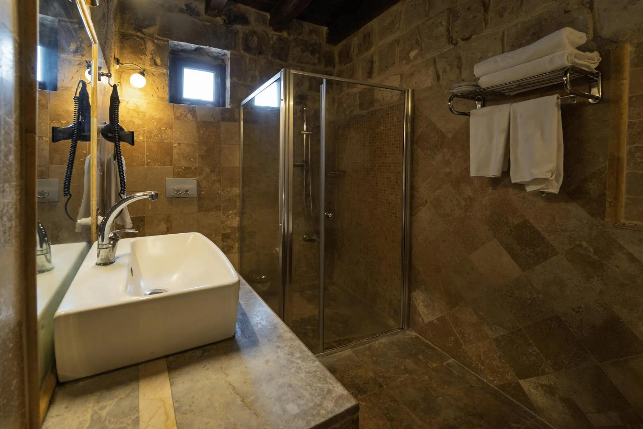 Shower in Grand Cave Suites