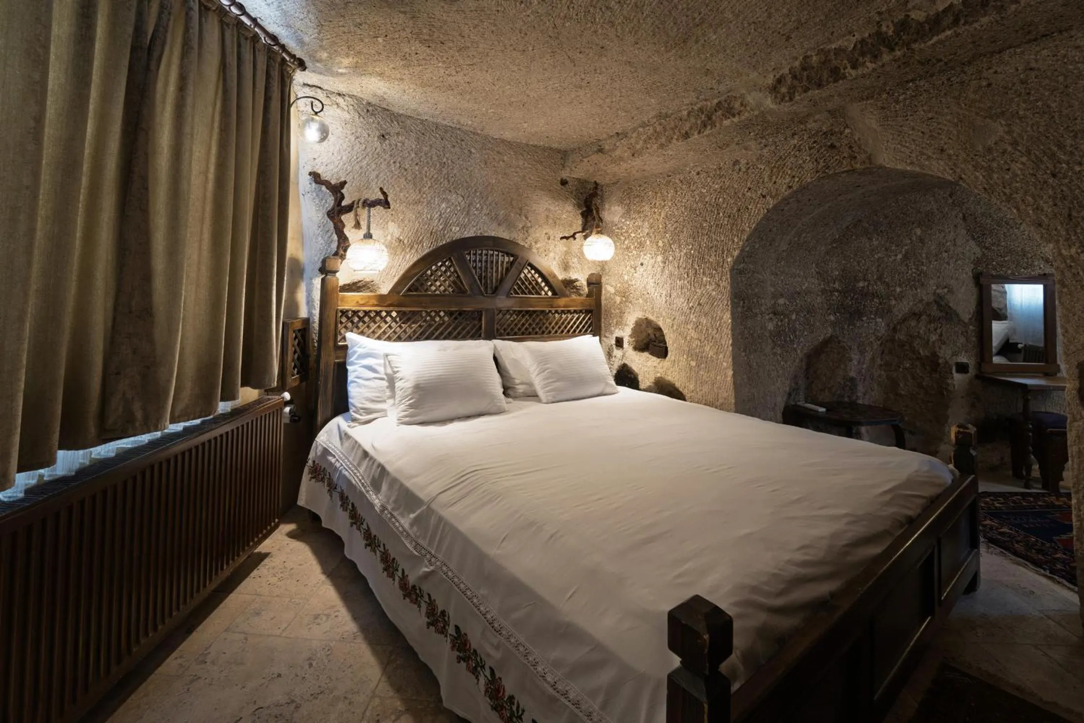 Bed in Grand Cave Suites